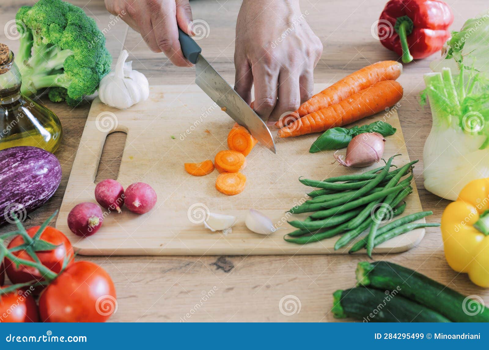 Hands Cutting Vegetables in the Kitchen Stock Image Image of