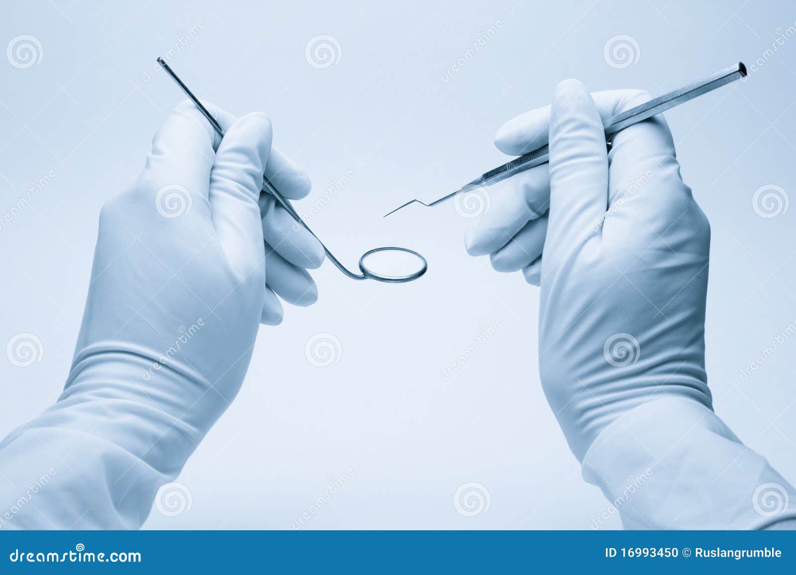 Hands Of Dentist Holding His Tools Stock Photo Image 16993450