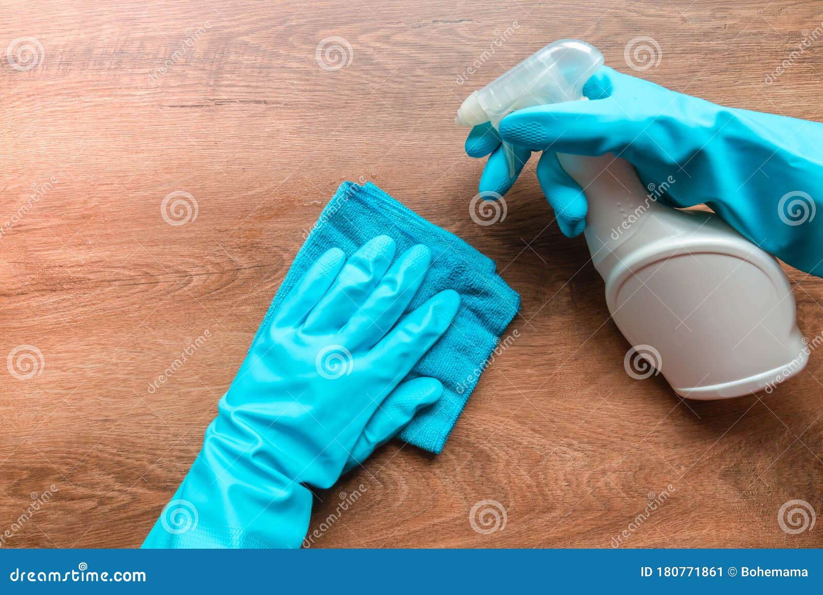 Hands in Gloves with Microfiber Cloth and Antibacterial Disinfecting