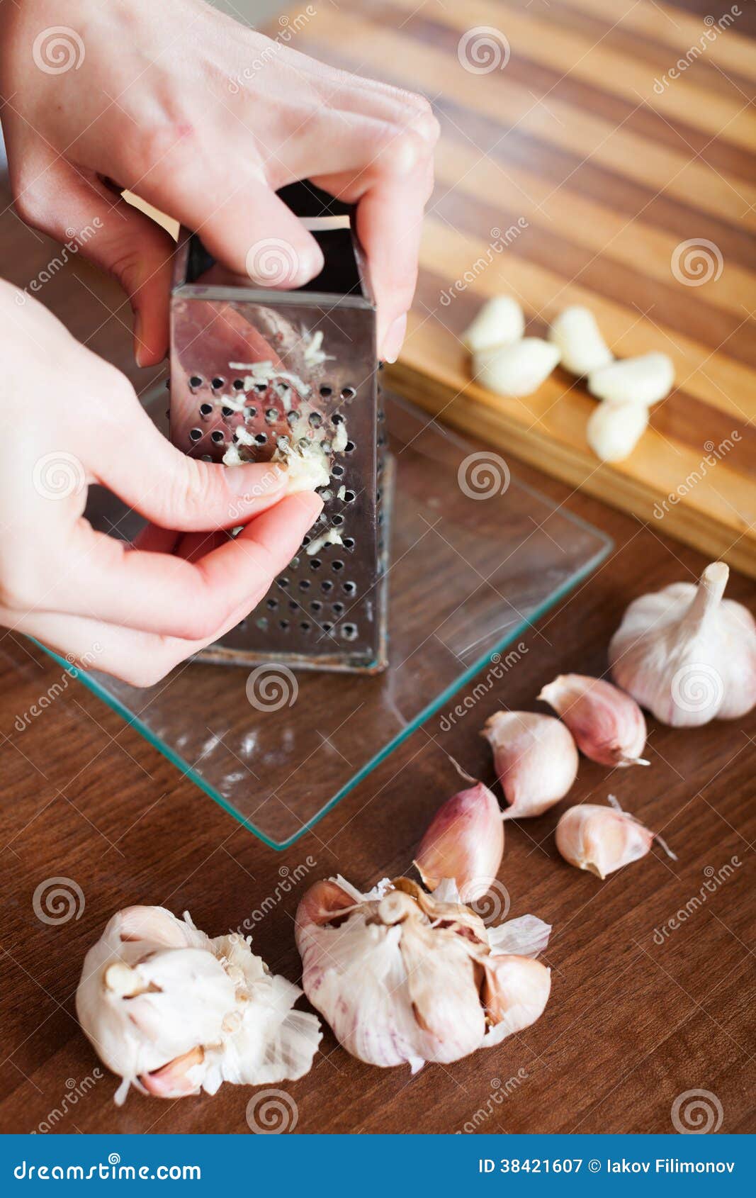 Hands grating garlic stock image. Image of girl, closeup 38421607