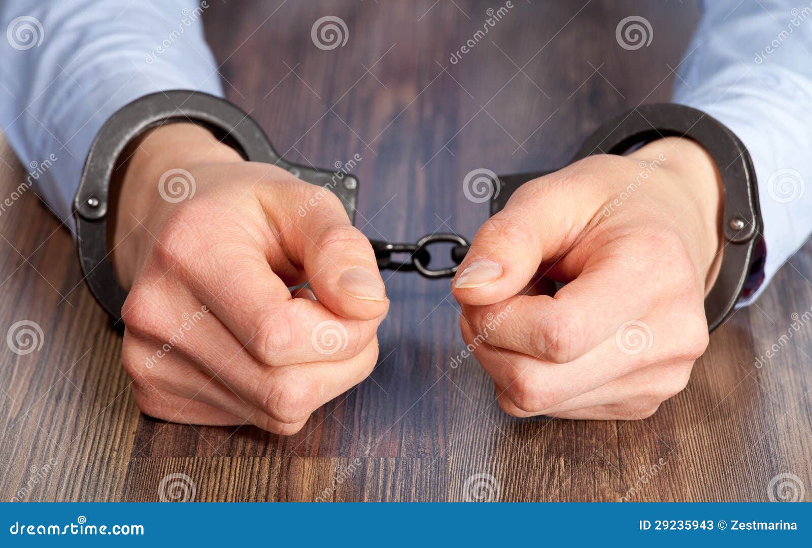Hands in handcuffs stock image. Image of closeup, detainee 29235943