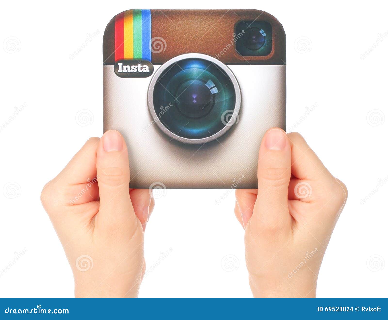 Hands hold Instagram logo editorial stock image. Image of network