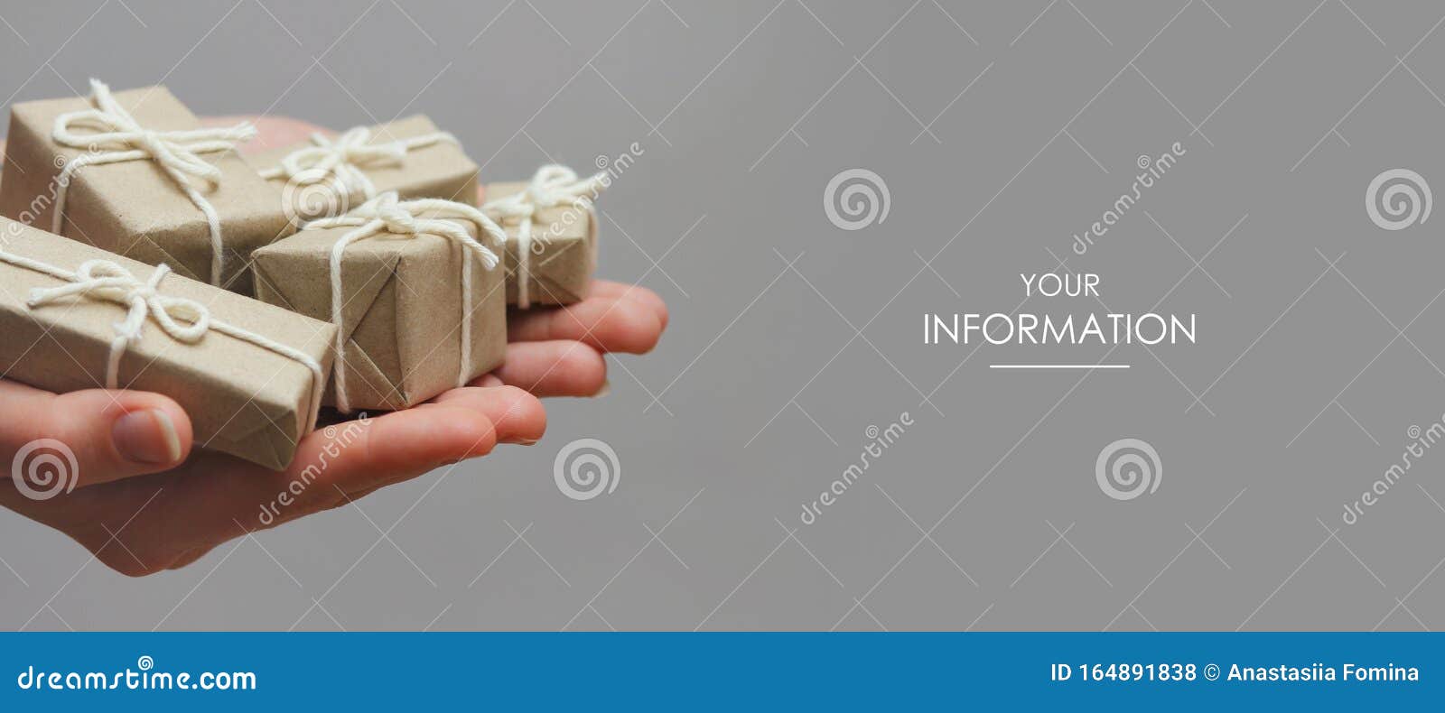 Hands Hold Set Of Gift Boxes. Delivery Service. Gray Background. Gift