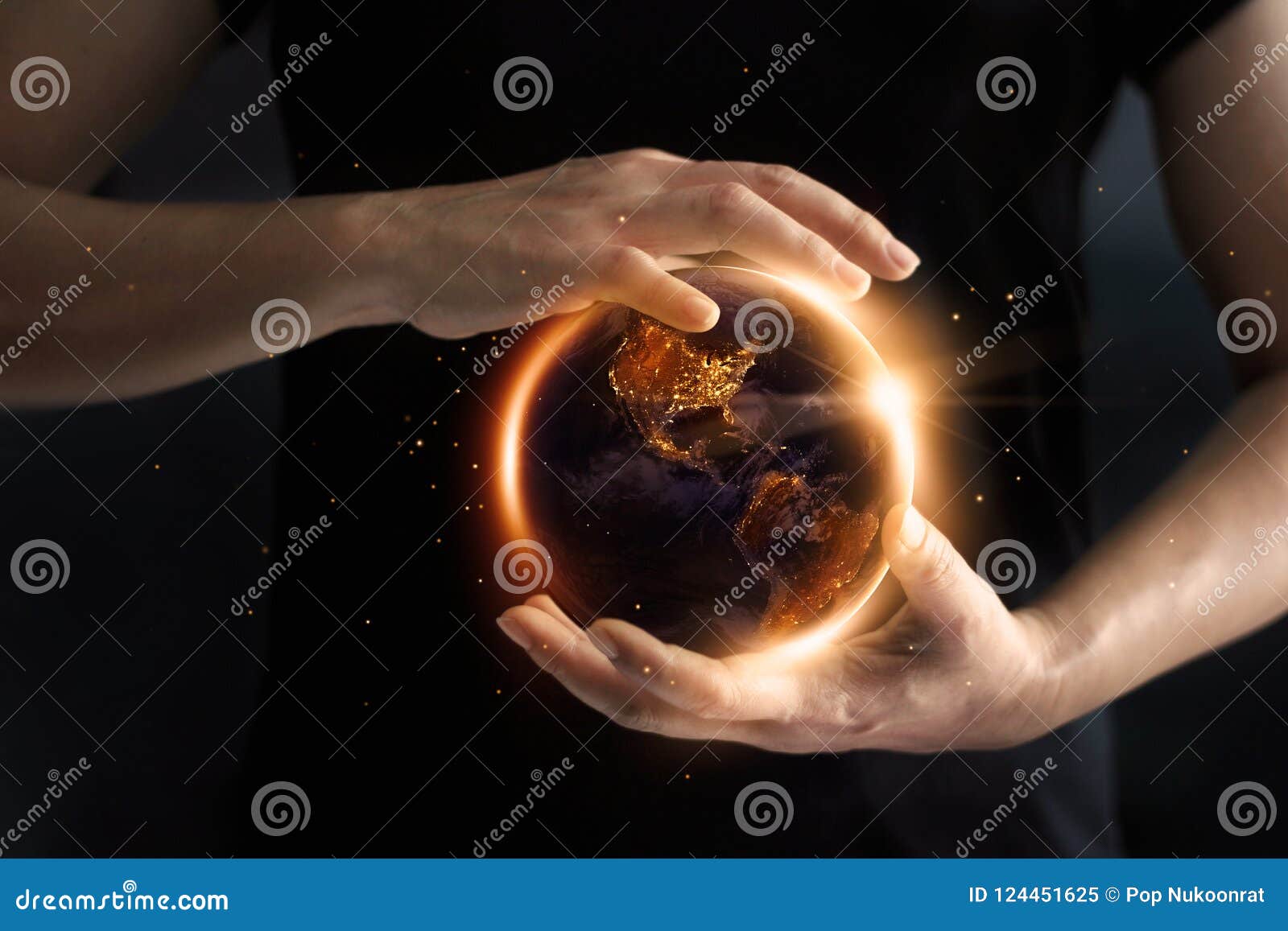 hands holding global showing the world` s energy consumption.