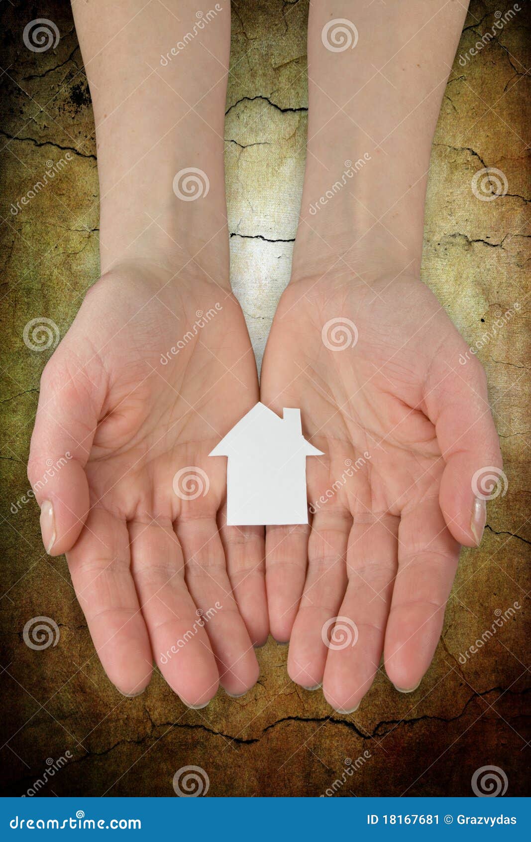 Real estate concept. hands holding a paper house icon