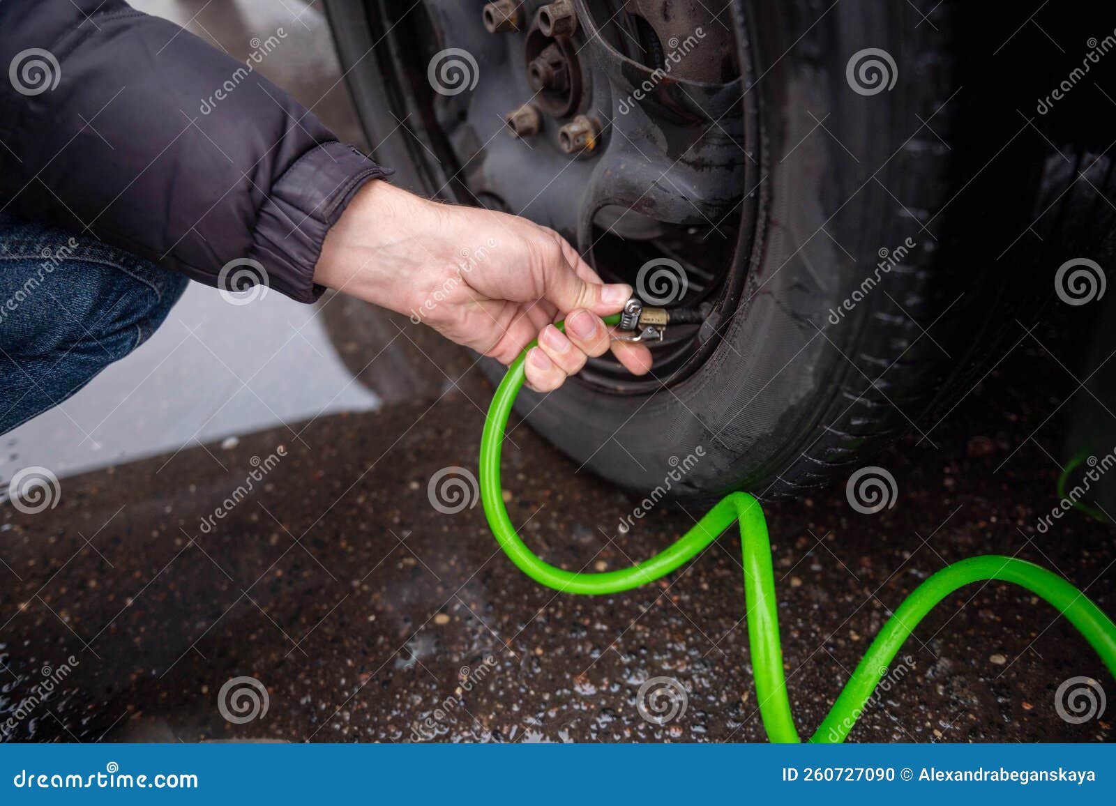 Hands Holding a Pump for a Car Tire Stock Photo Image of addr, hands
