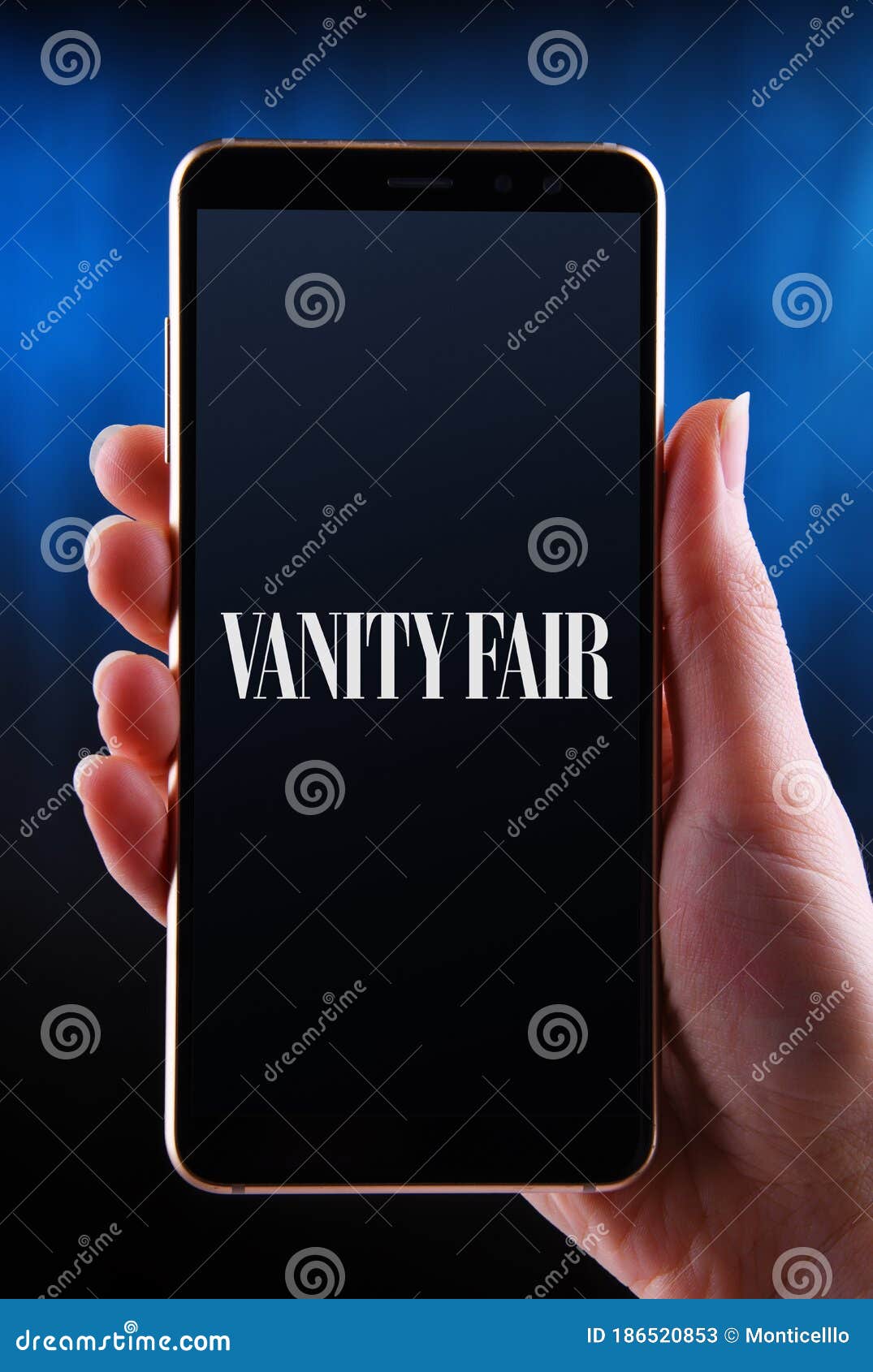 Hands Holding Smartphone Displaying Logo of Vanity Fair Editorial Stock  Photo - Image of application, hands: 186518438