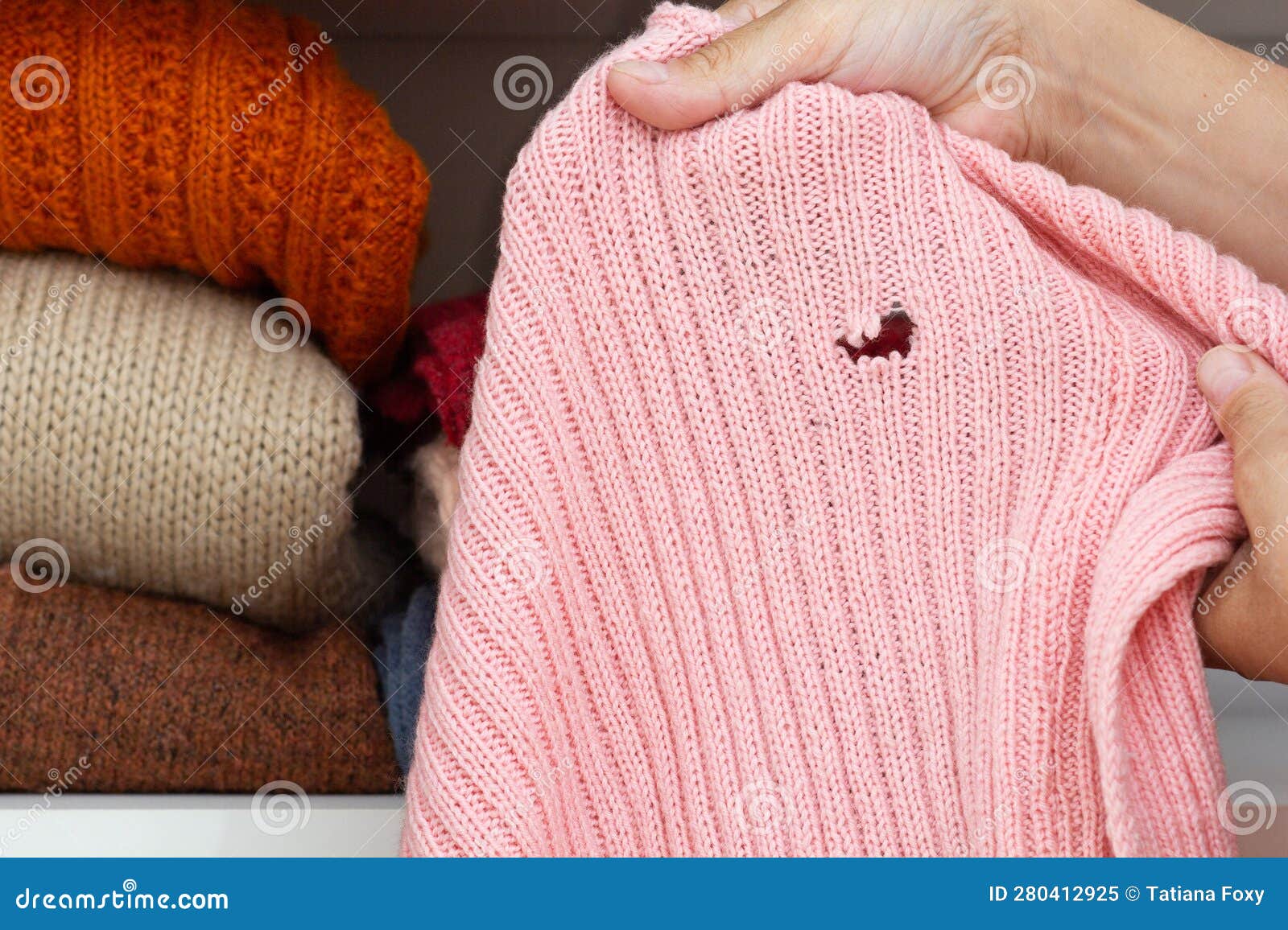 Hands Holding Woolen Knitted Cloth with Hole Stock Image - Image of ...