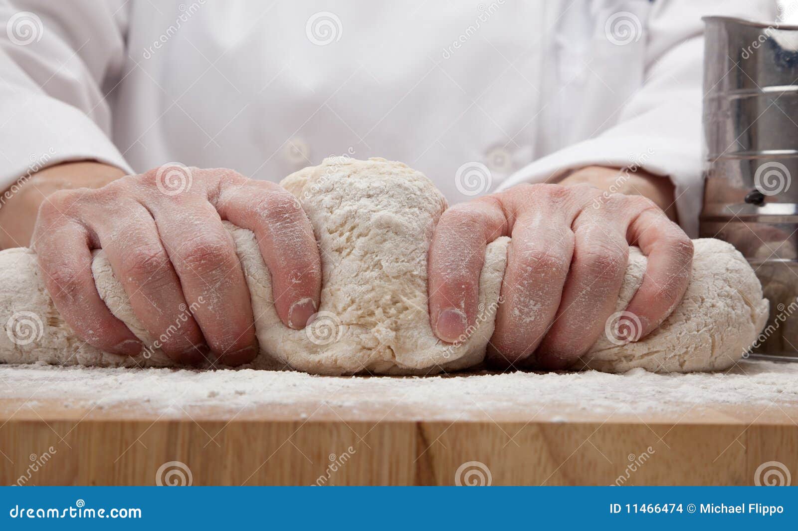 Hands kneading bread dough stock photo. Image of preparing 11466474