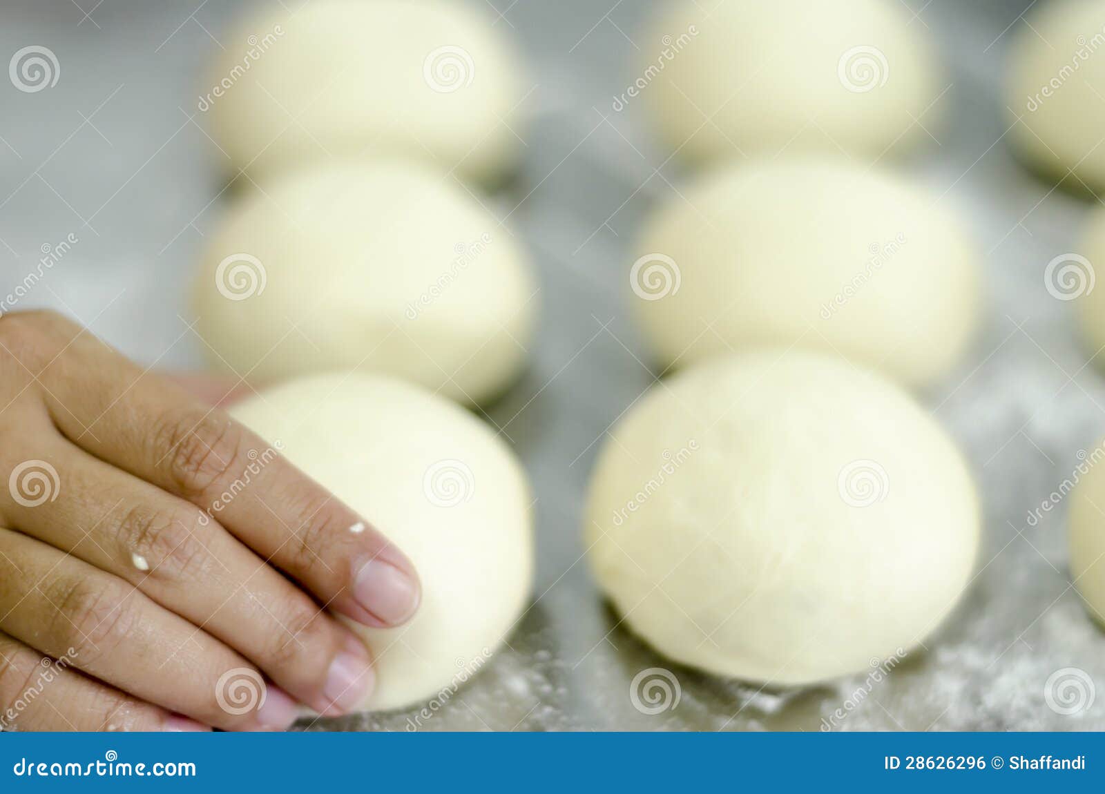 Hands kneading bread dough stock photo. Image of grain 28626296