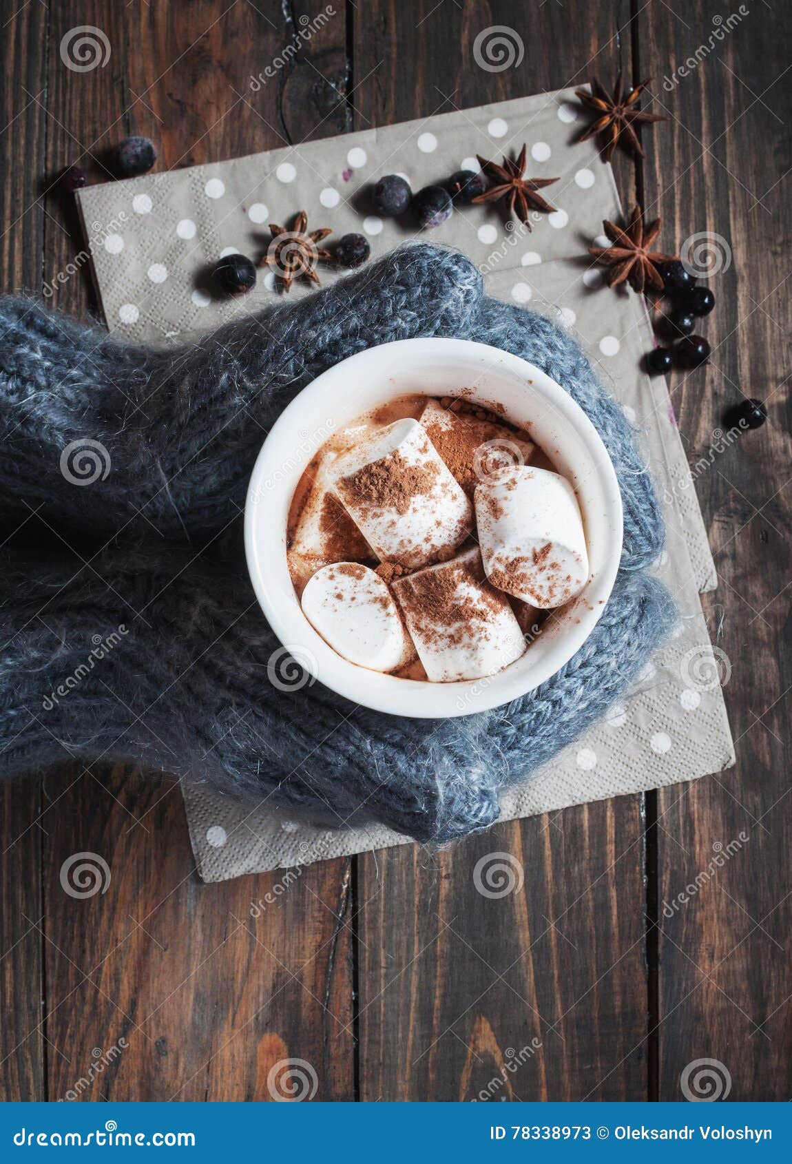 Glass cup of Hot chocolate with marshmallows in knitted cup holder with  cookies, chopping chocolate and mittens over wooden wind Stock Photo - Alamy