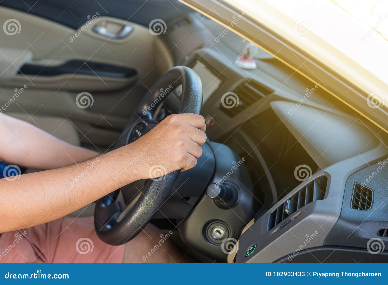 Hands Man Holding Steering Wheel and on Automatic Gear Shift Stock
