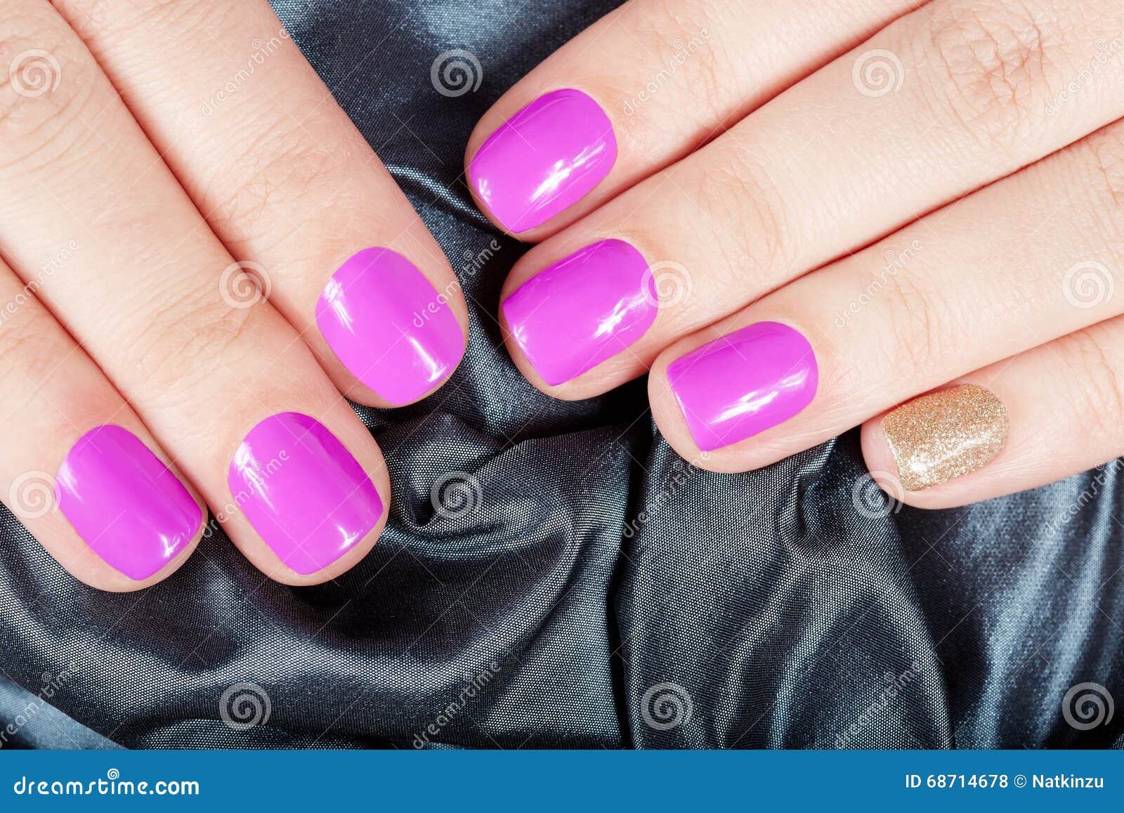 Hands with Manicured Nails Covered with Pink and Gold Nail Polish Stock ...