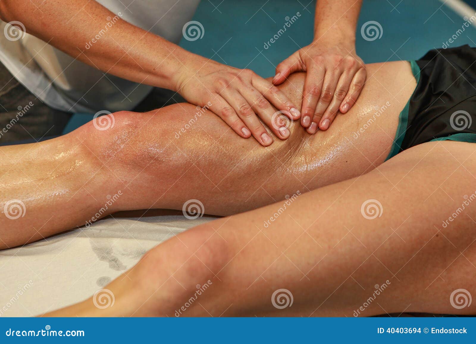 hands massaging athlete's thigh after running