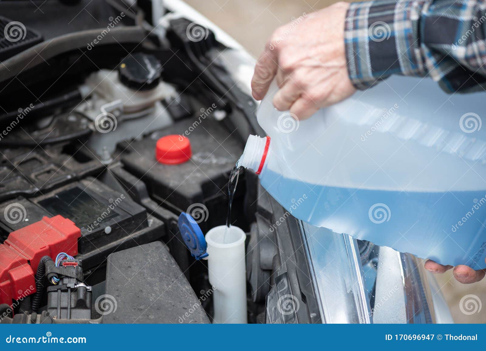 Hands of Mechanic Pouring Windshield Washer Fluid in a Car Stock Image Image of cooling