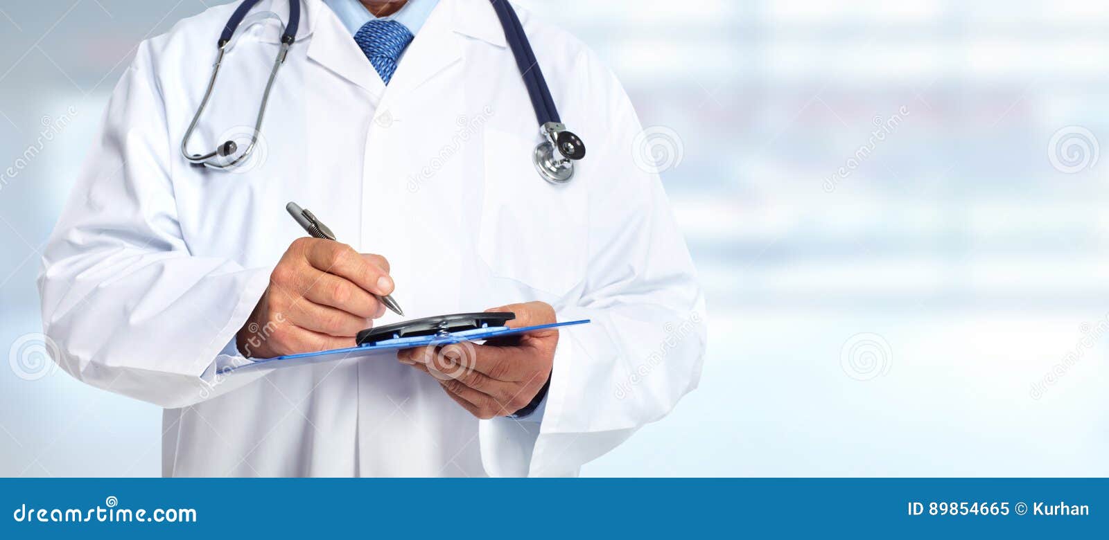 hands of medical doctor with clipboard.