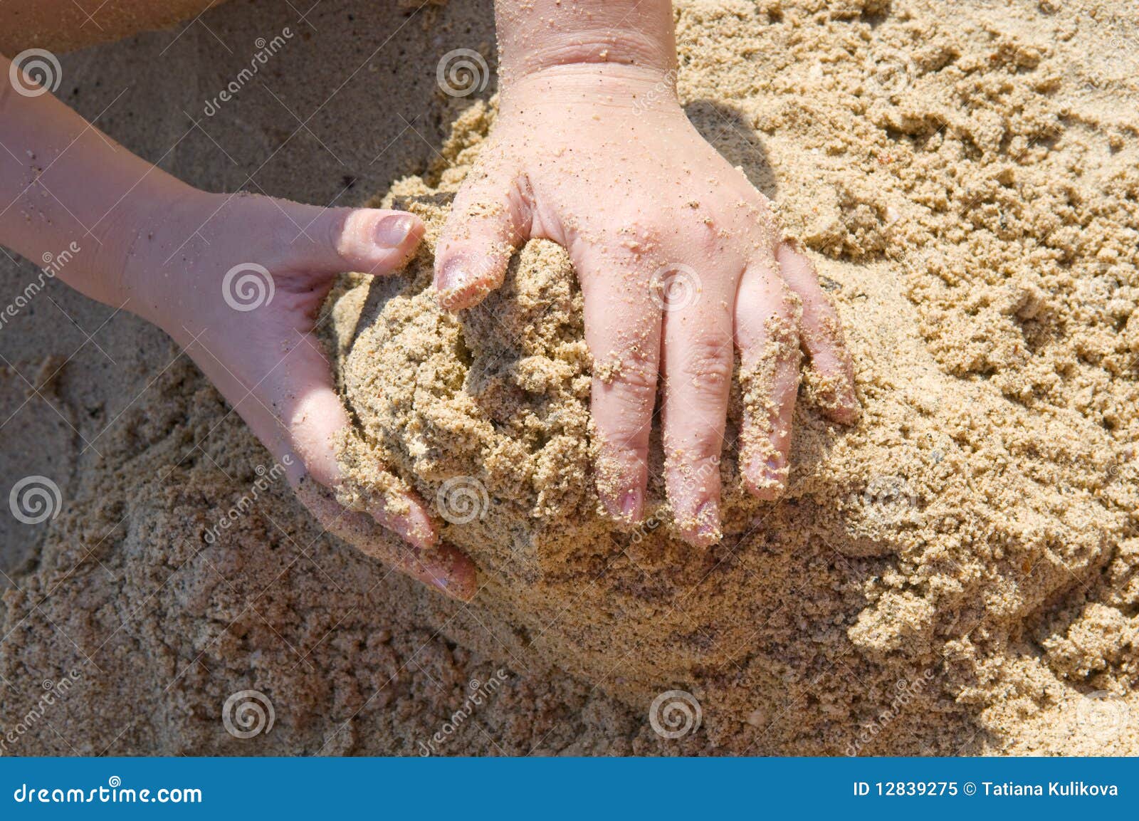 Hands moulding the castle stock image. Image of grab 12839275