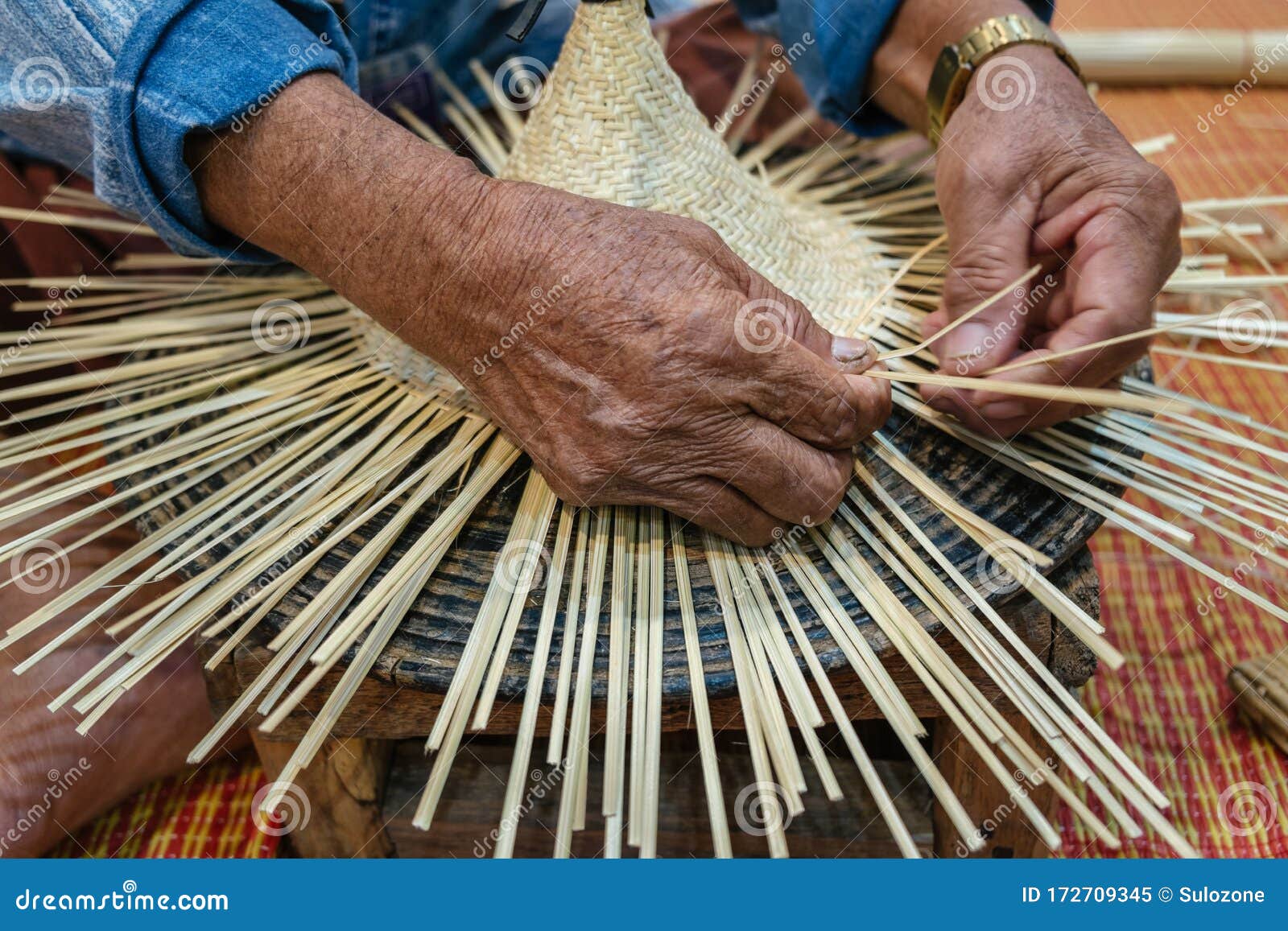 Hands of Craftsman Weaving Rattan and Bamboo To Make Traditional Thai ...
