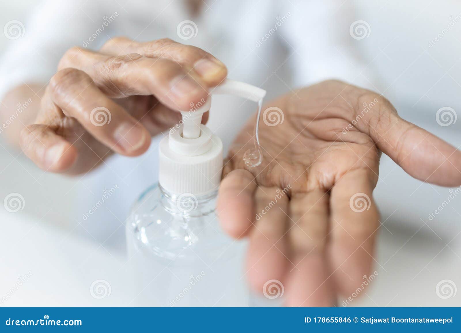 hands of old people,elderly using alcohol antiseptic gel,cleaning,prevent infection,protective outbreak of covid-19,senior woman