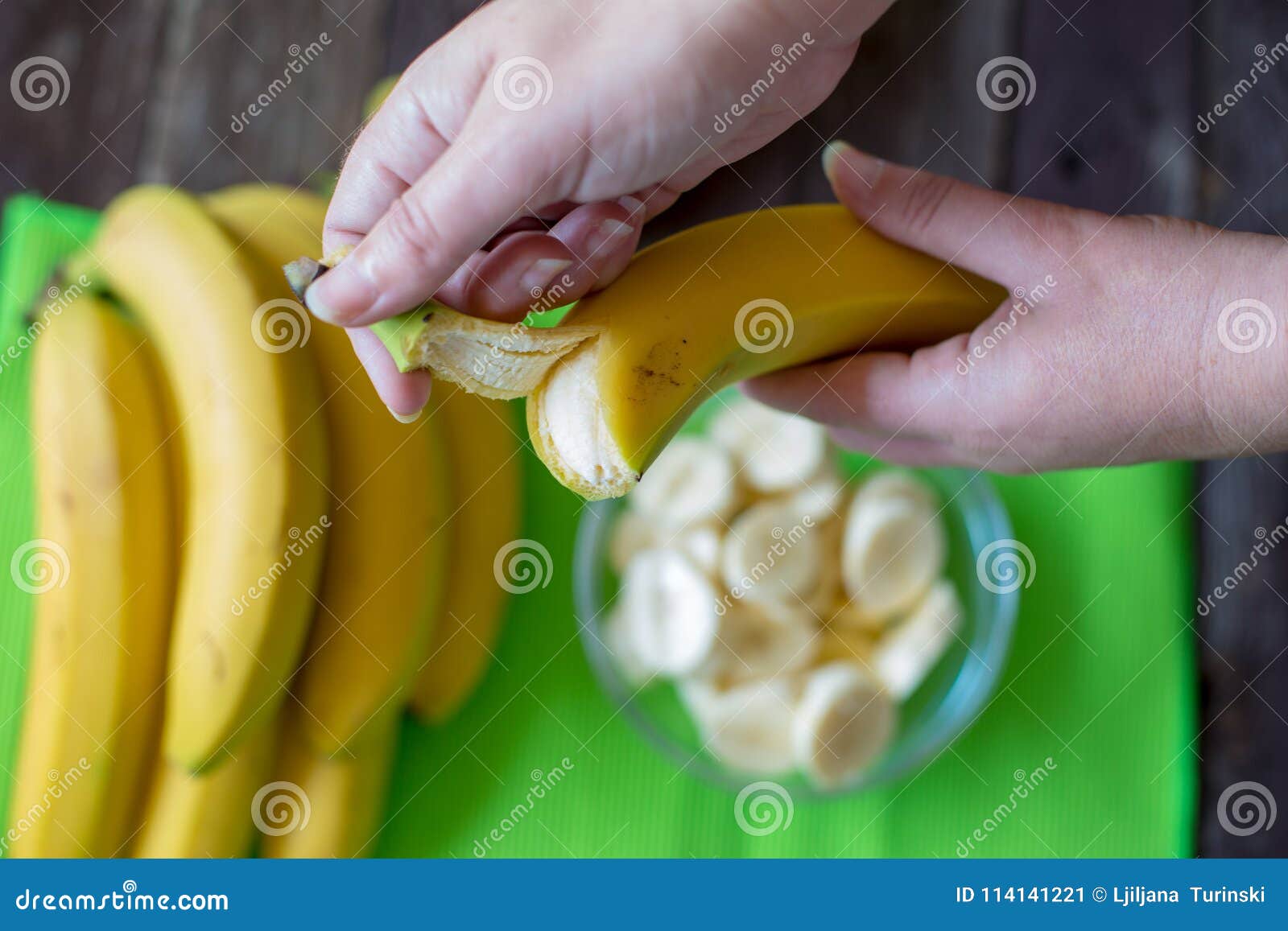 hands peeling a banana for breakfast