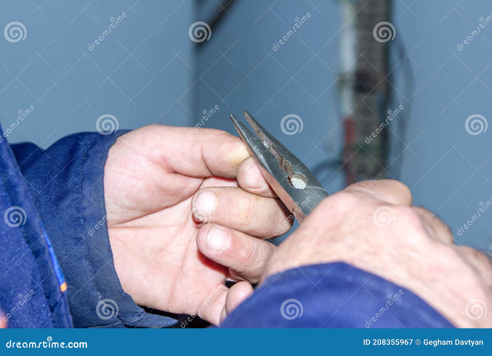 Hands of a Person Holding a Pliers Stock Image Image of manufacturing
