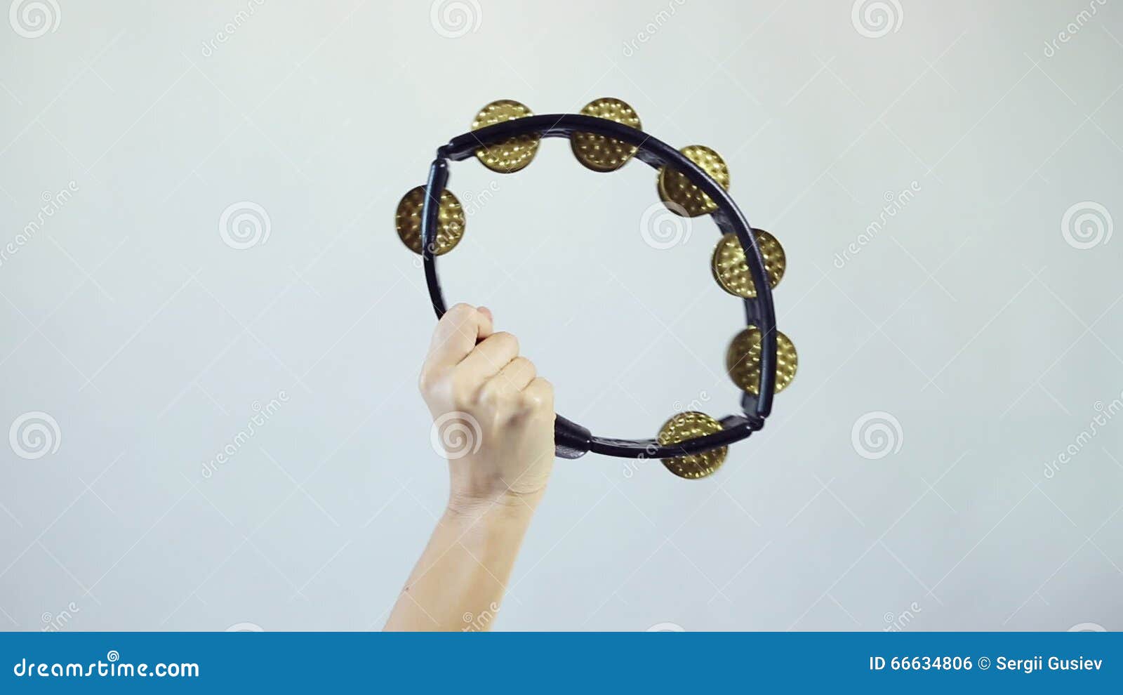 Hands Playing on Tambourine (shaker) Stock Footage Video of