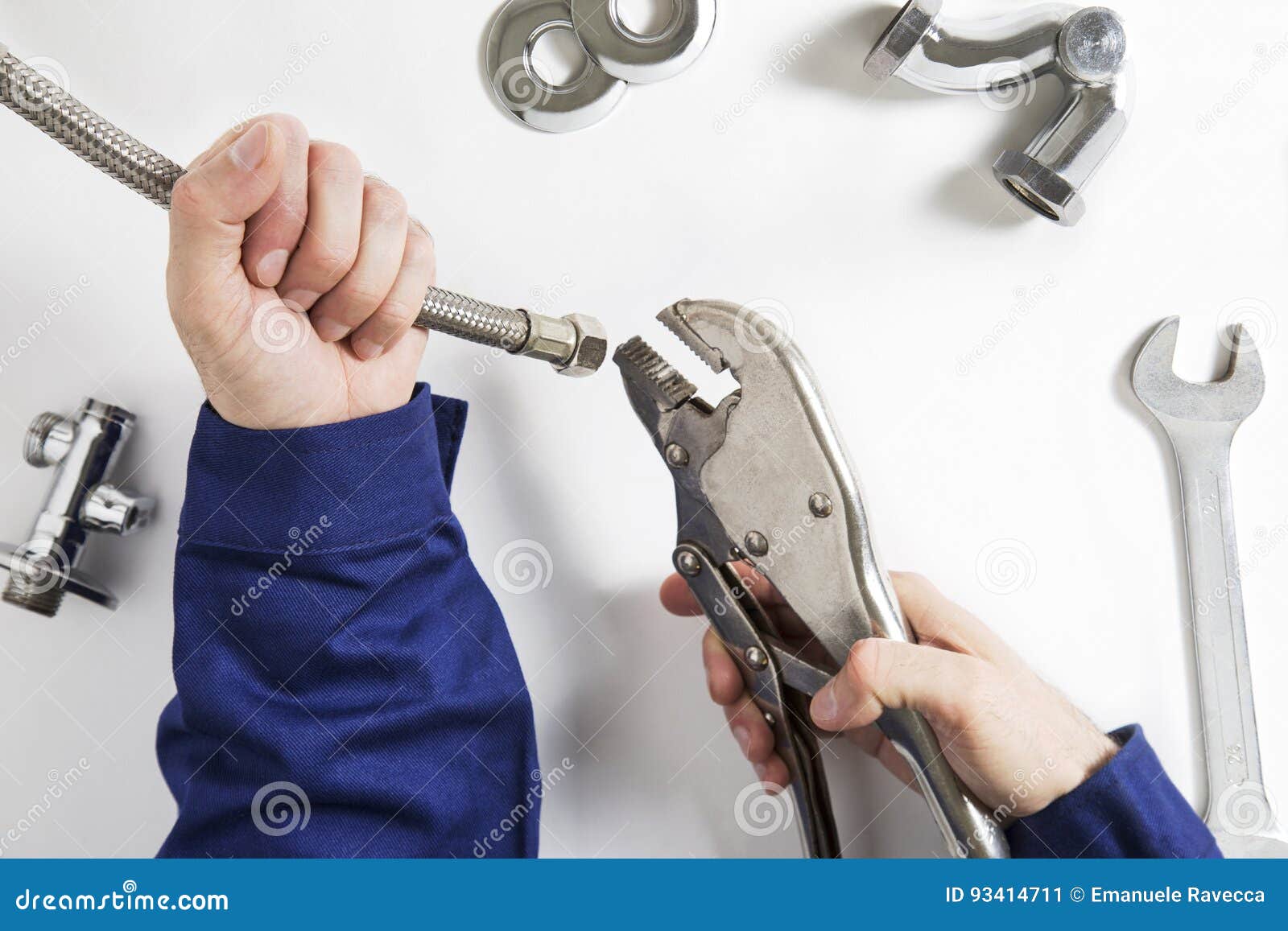 Hands of plumber at work stock image. Image of copper 93414711