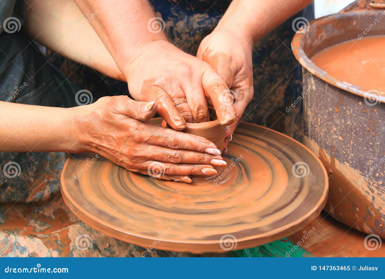 Hands of a potter closeup stock image. Image of human 147363465