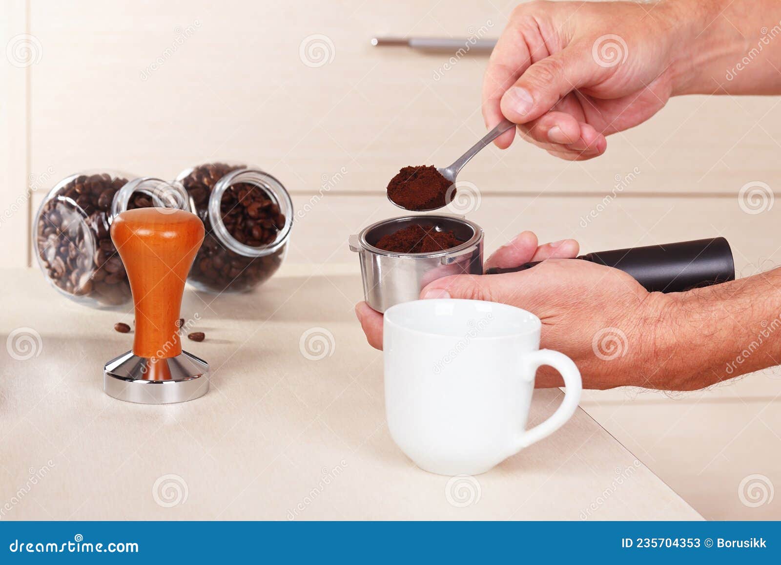 Hands Pours Ground Coffee into the Holder of Coffee Machine Stock Image
