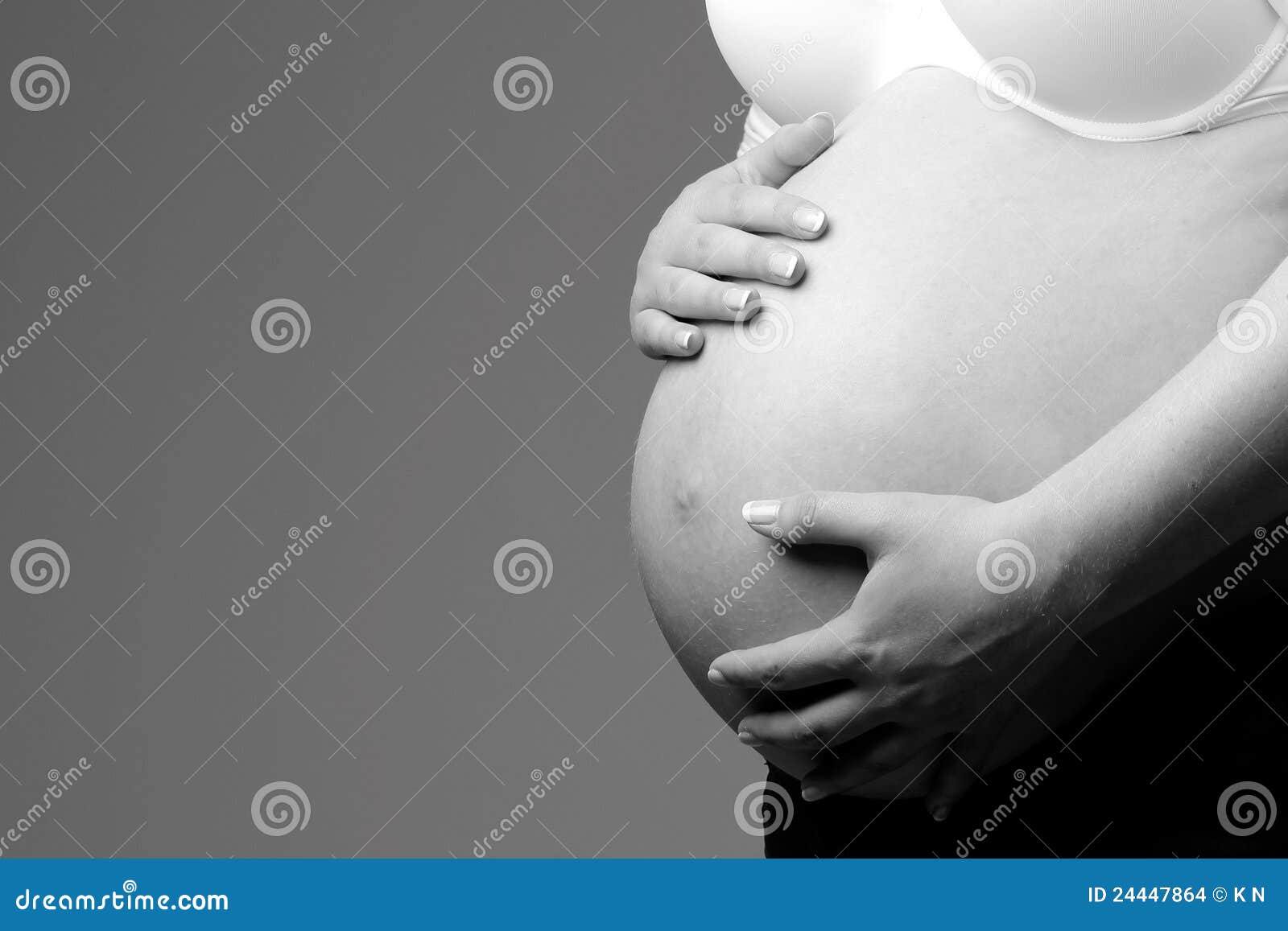 Hands on pregnant belly stock photo. Image of background 24447864