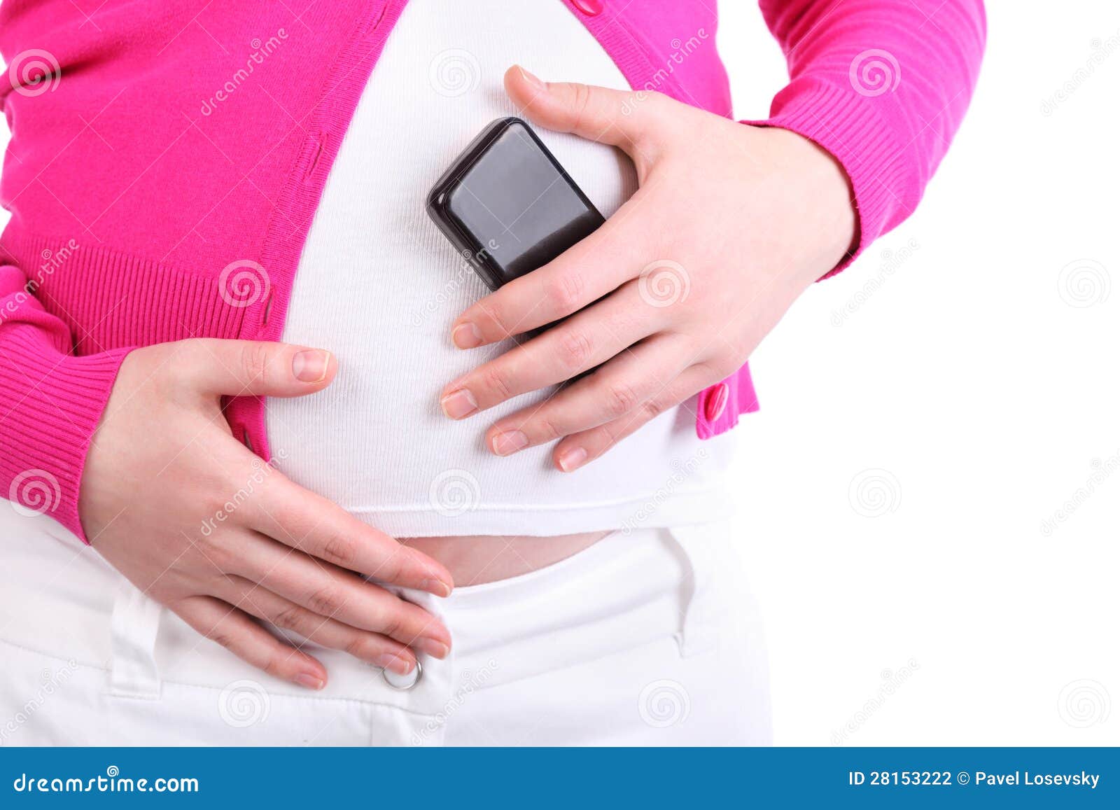 hands of pregnant woman holding phone near abdomen