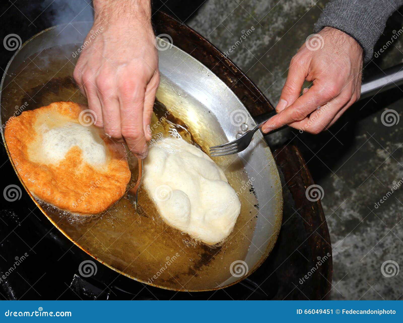 Hands during Preparation of Pancakes in Hot Oil Stock Image Image of frying, fair 66049451