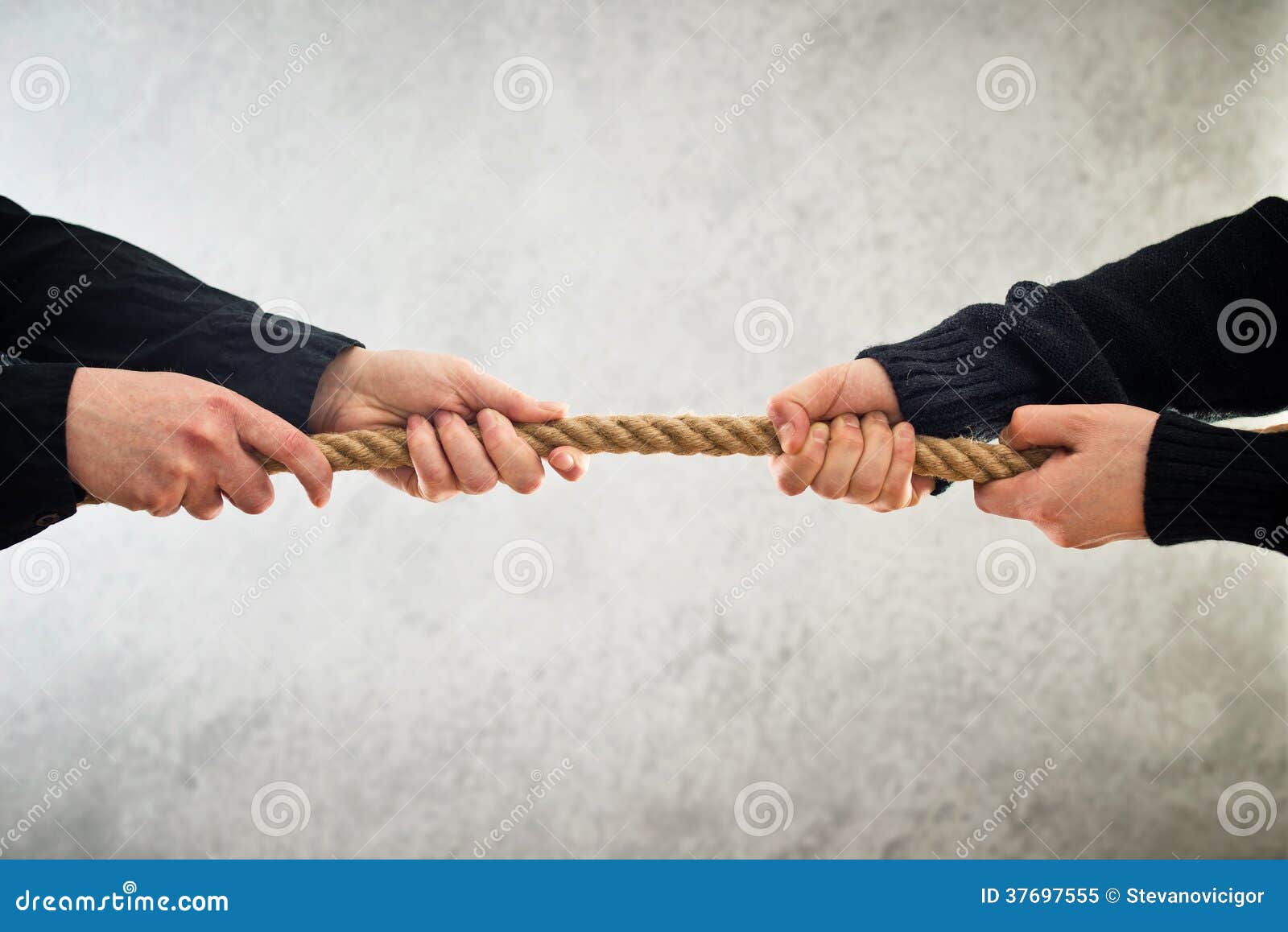 Hands Pulling Rope To Opposite Sides Stock Image - Image of