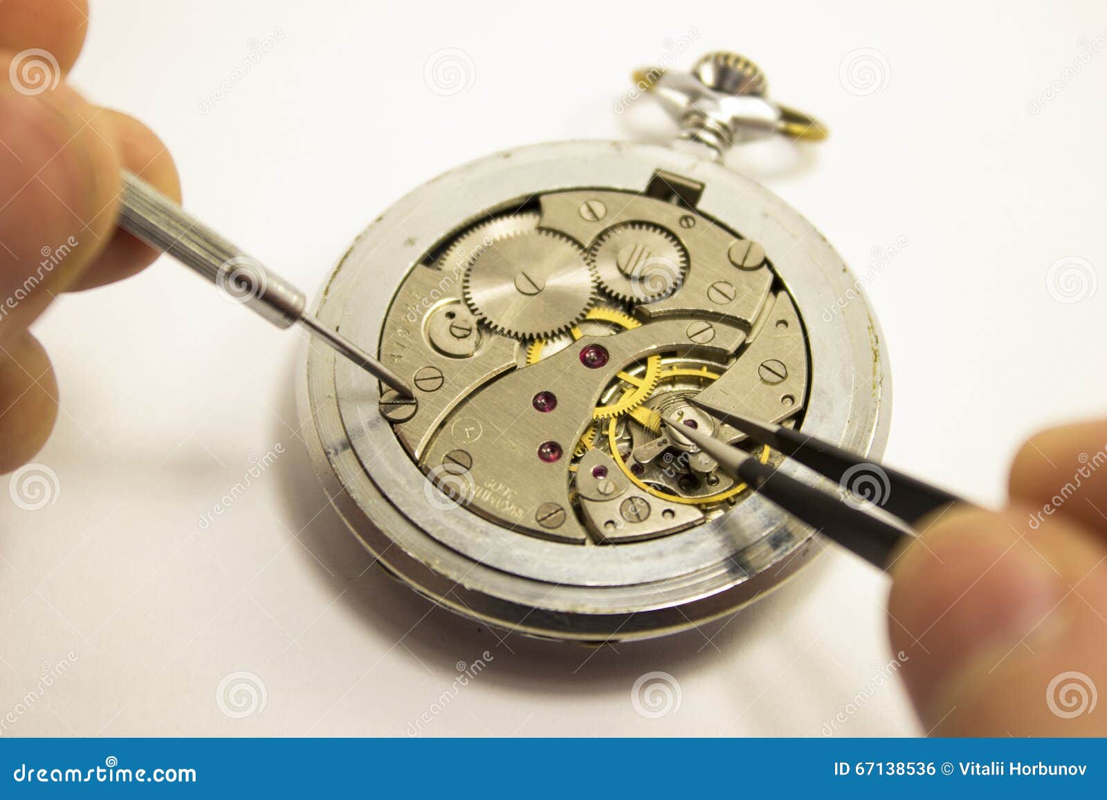 Hands repair an old watch stock photo. Image of pieces 67138536