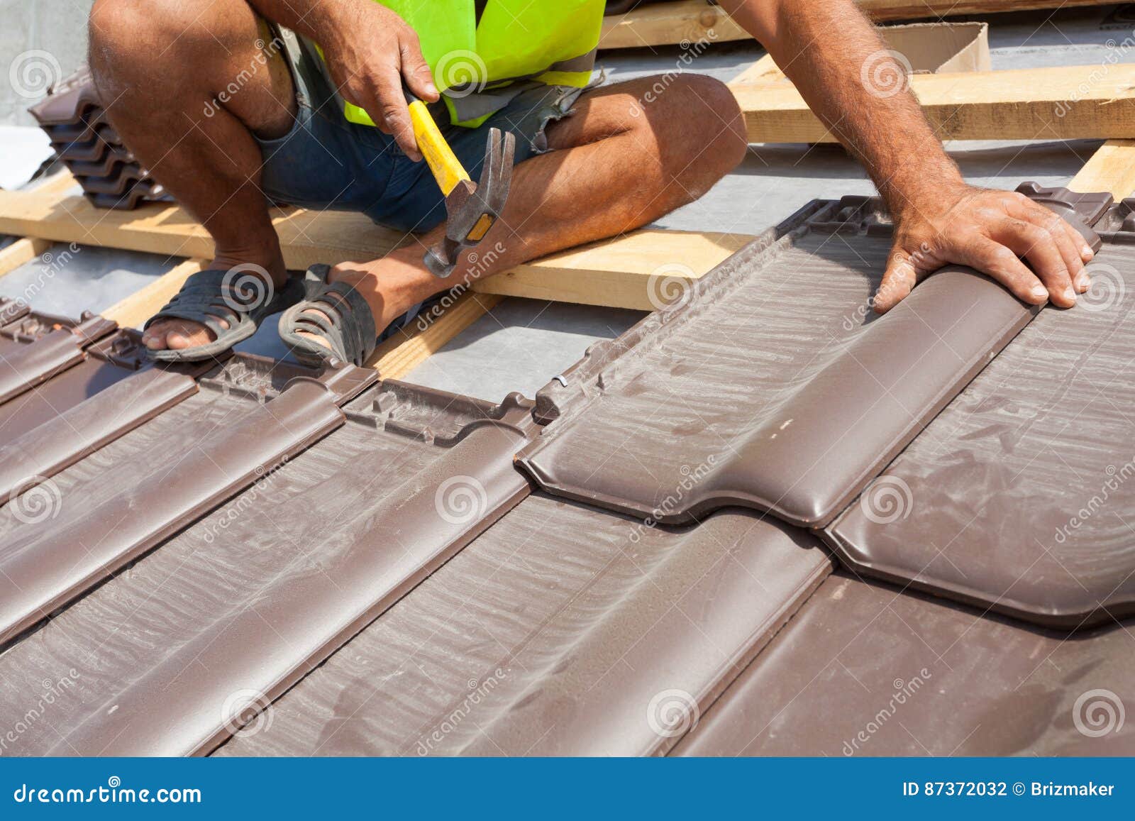 Laying And Installing Asphalt Shingles. House Roof Asphalt Shingles