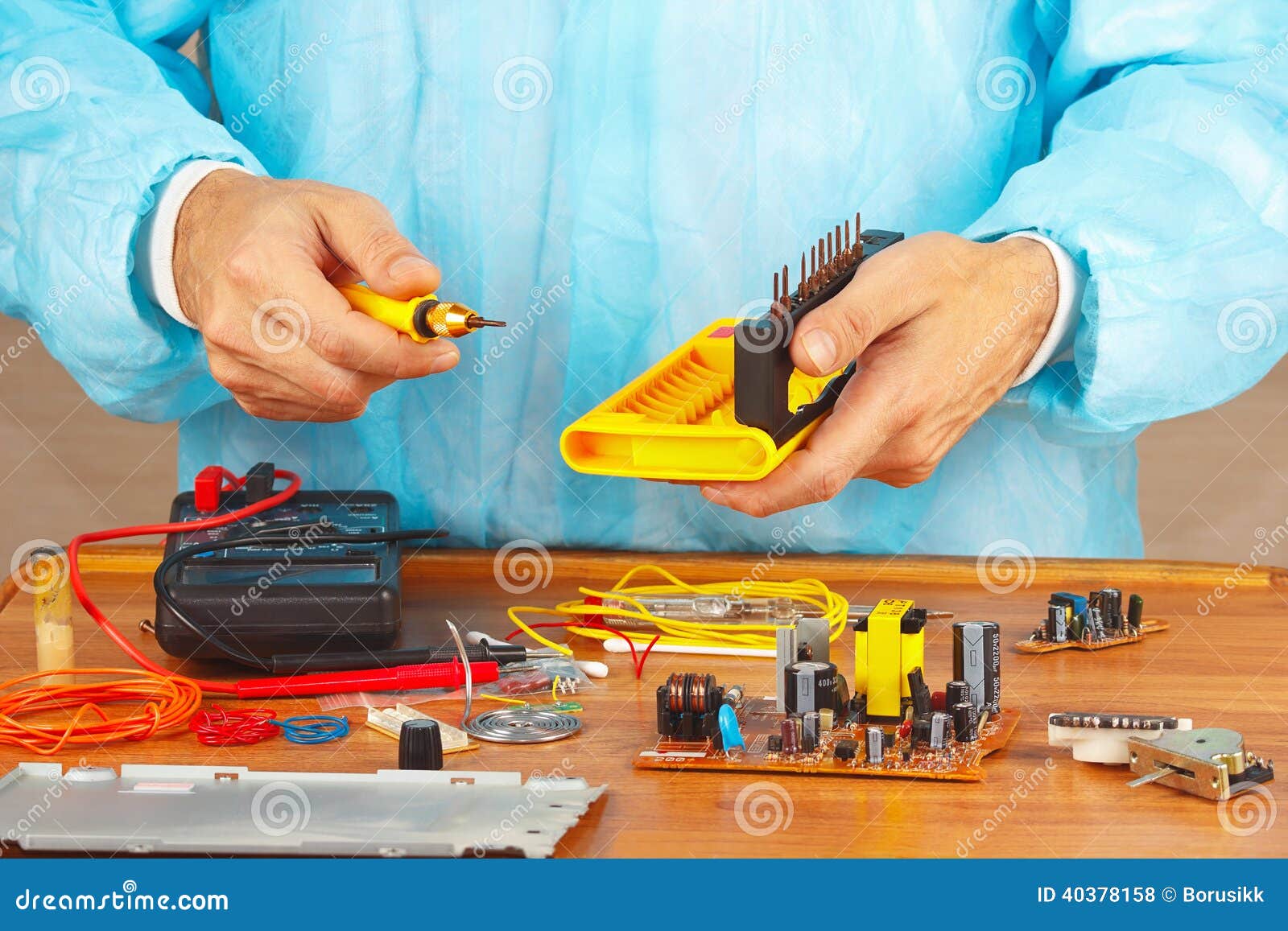 hands service engineer of electronic equipment in service workshop