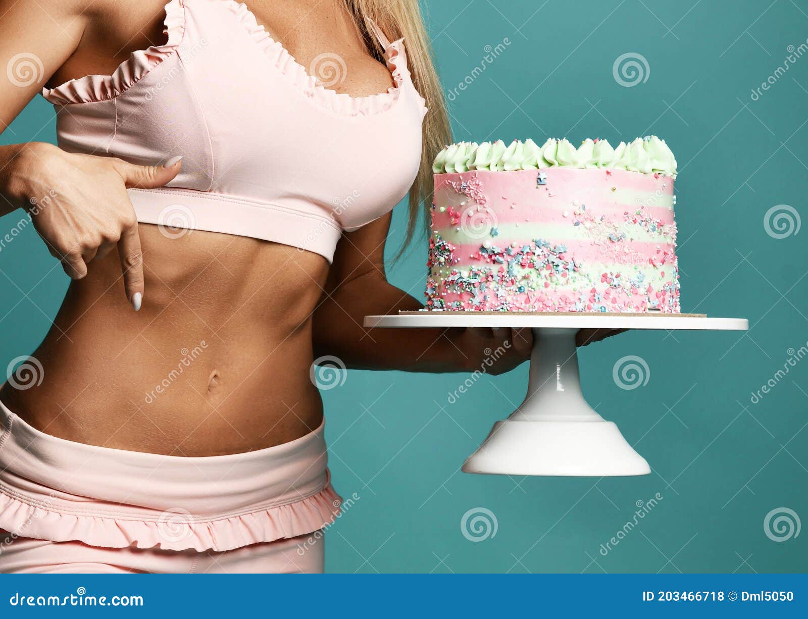 Hands of Pretty Fitness Slim Woman in Pink Bra Holding Birthday Cake with  Cream and Pointing at Slim Sporty Belly Stock Photo - Image of pink,  attractive: 203466718
