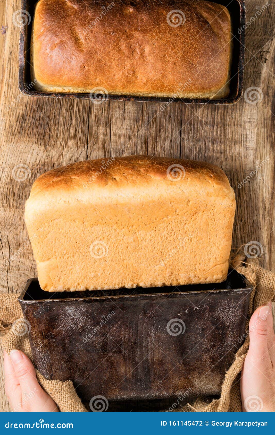 Hands Shaking Out White Bread from a Baking Dish Stock Photo Image of