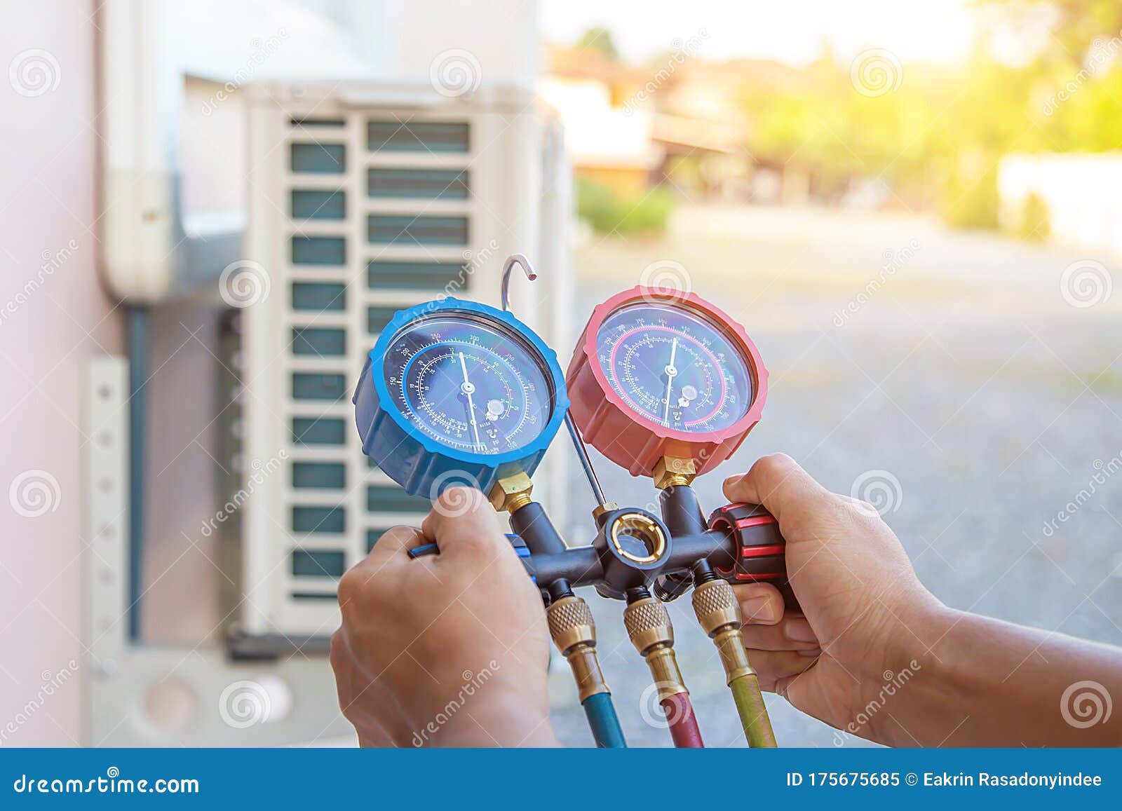 The Hands of Technician are Using a Measuring Tool To Check Vacuum Pump