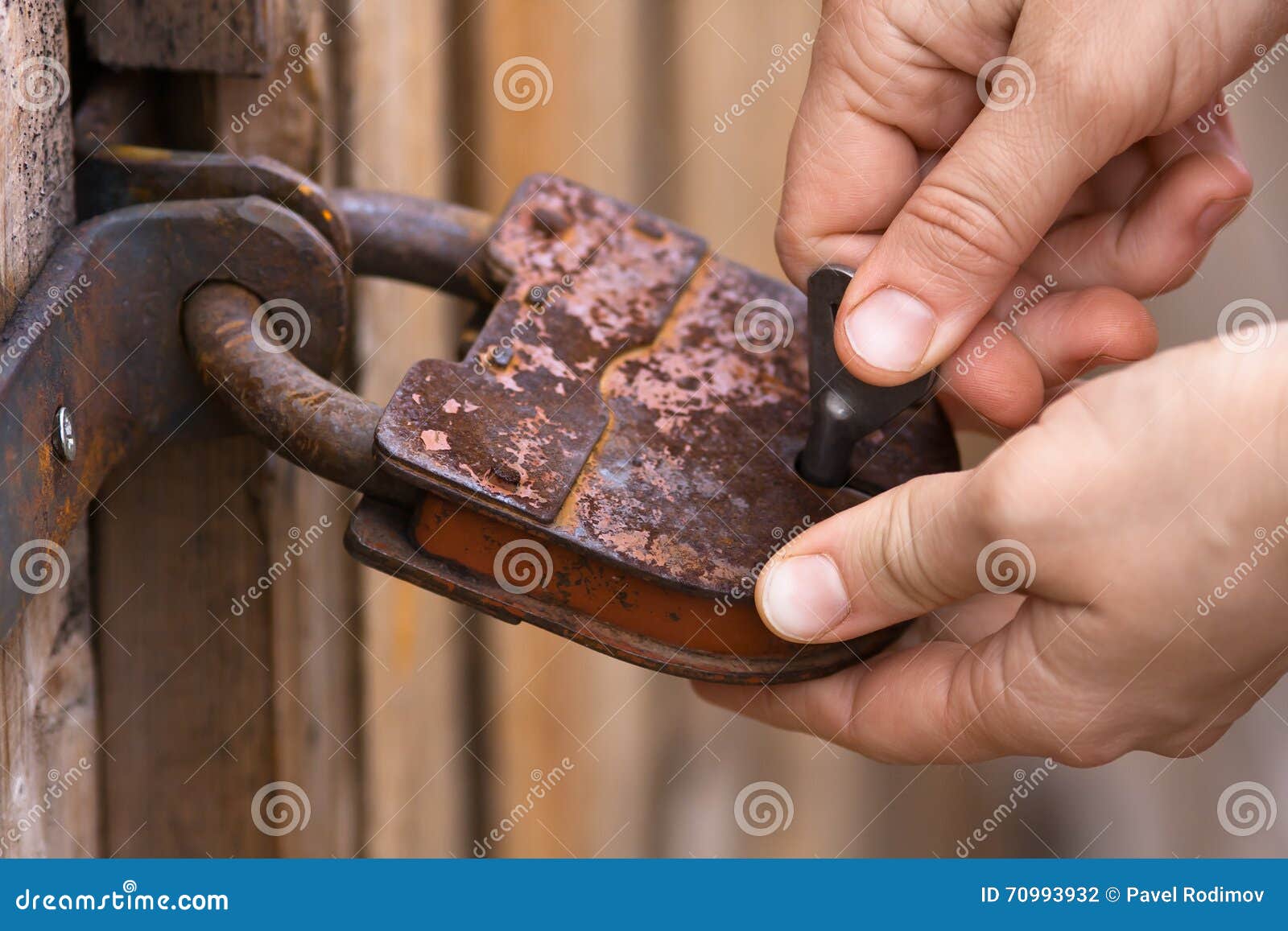 Hands Unlocking the Padlock Stock Photo Image of enter, secure 70993932