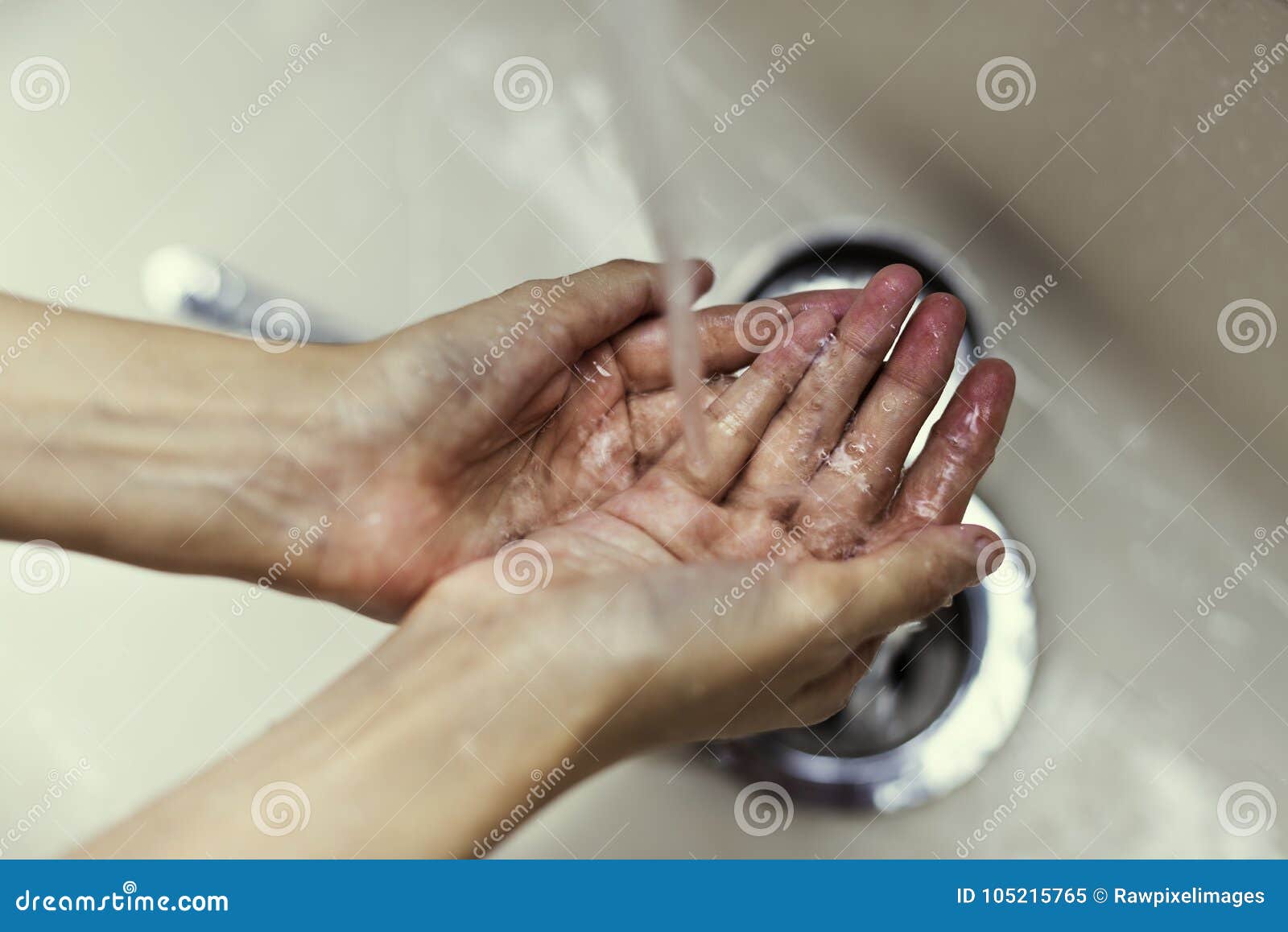 Hands washing at a sink stock image. Image of washing 105215765