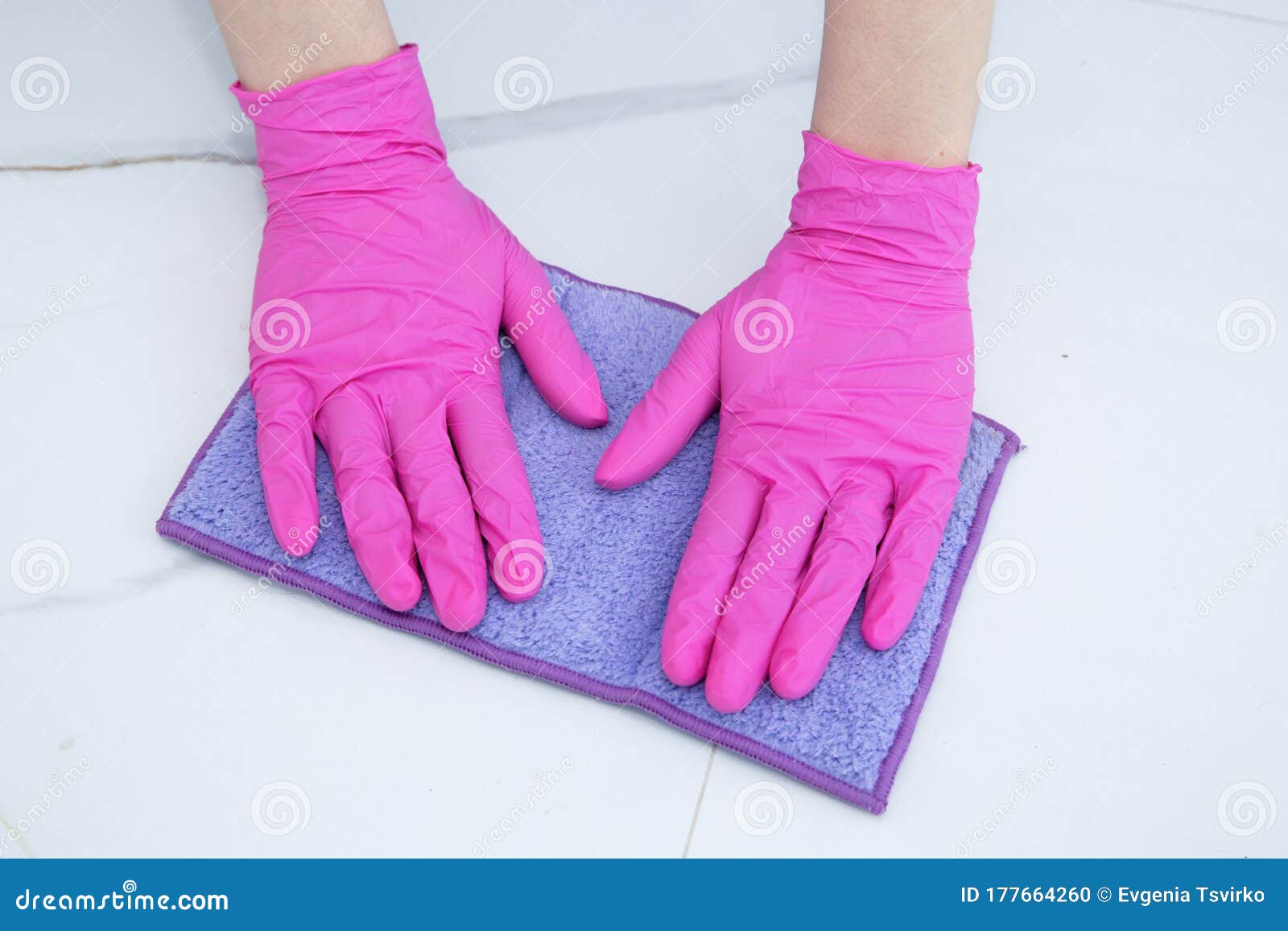 Hands Wearing Pink Gloves for Cleaning, Floor Cleaning with Hands