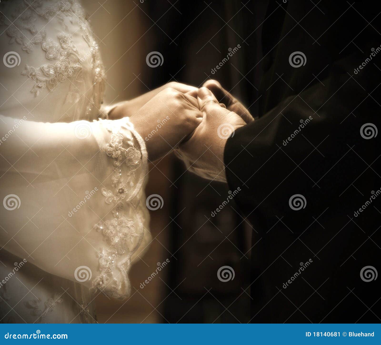 hands in wedding ceremony