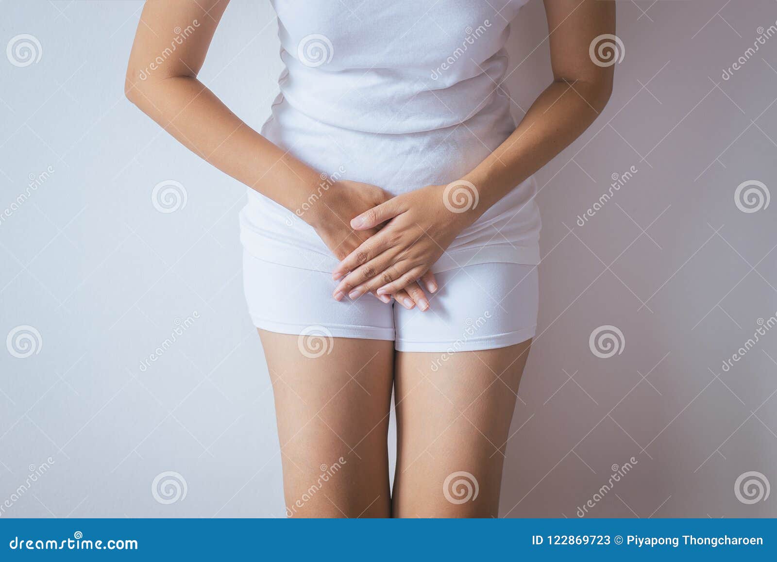 hand woman holding her crotch,female need to pee