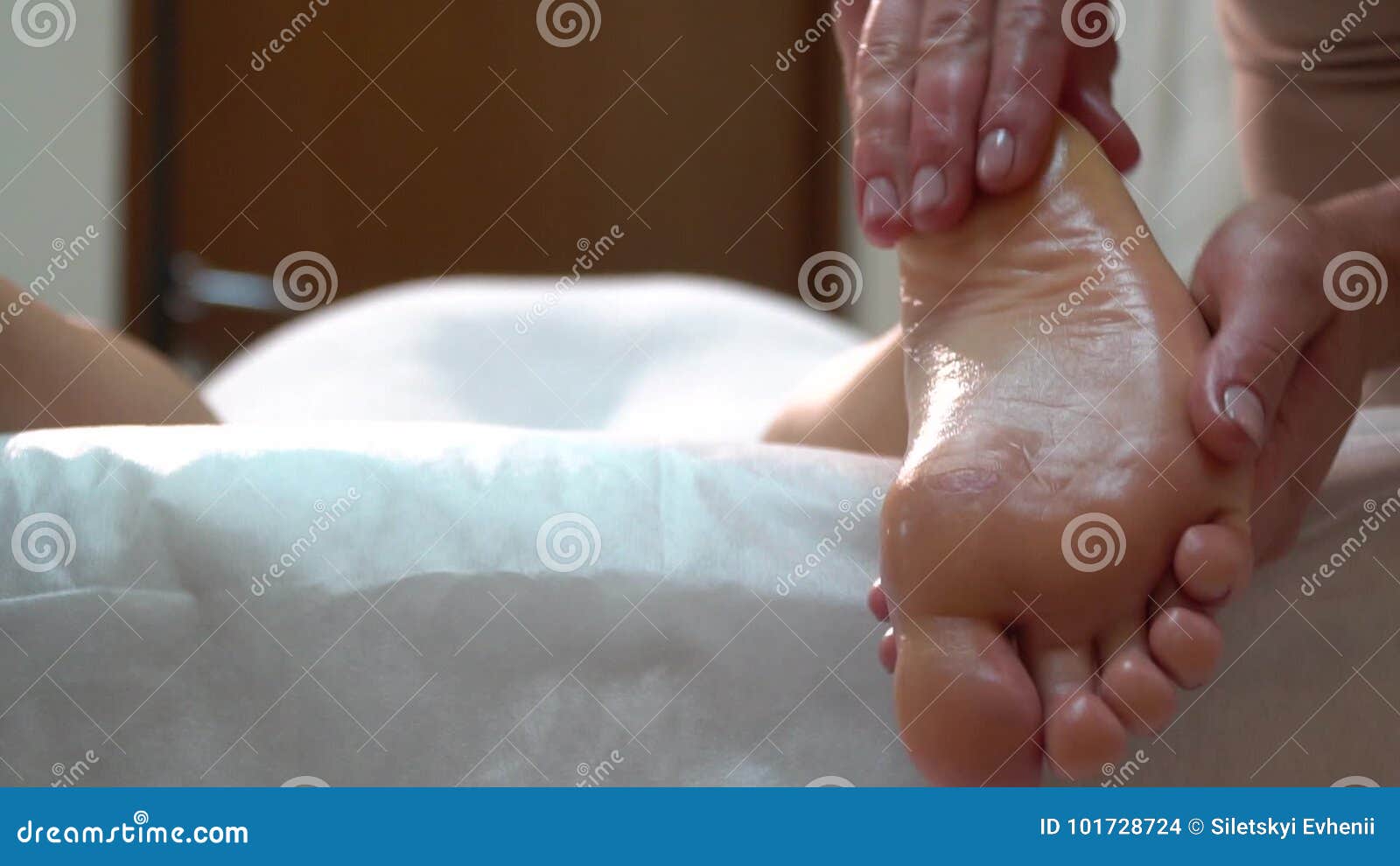 Masseuses feet sprayed