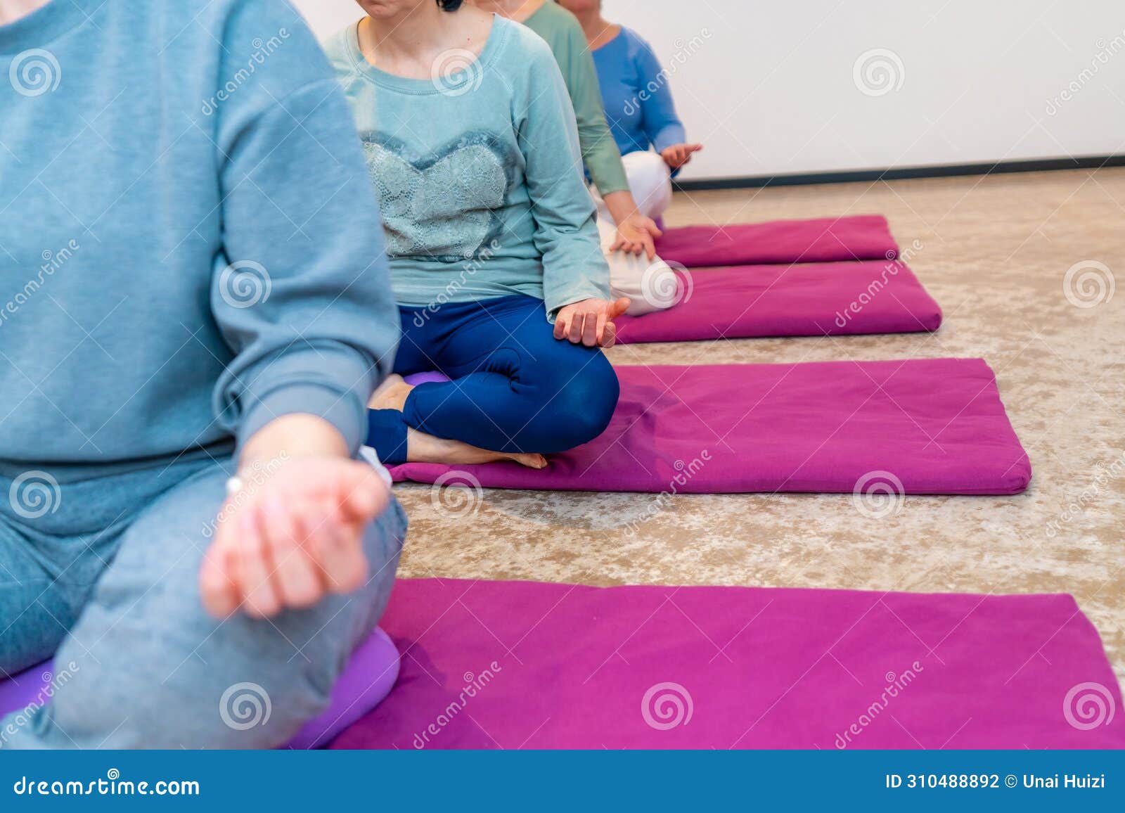 hands of women in lotus position of yoga