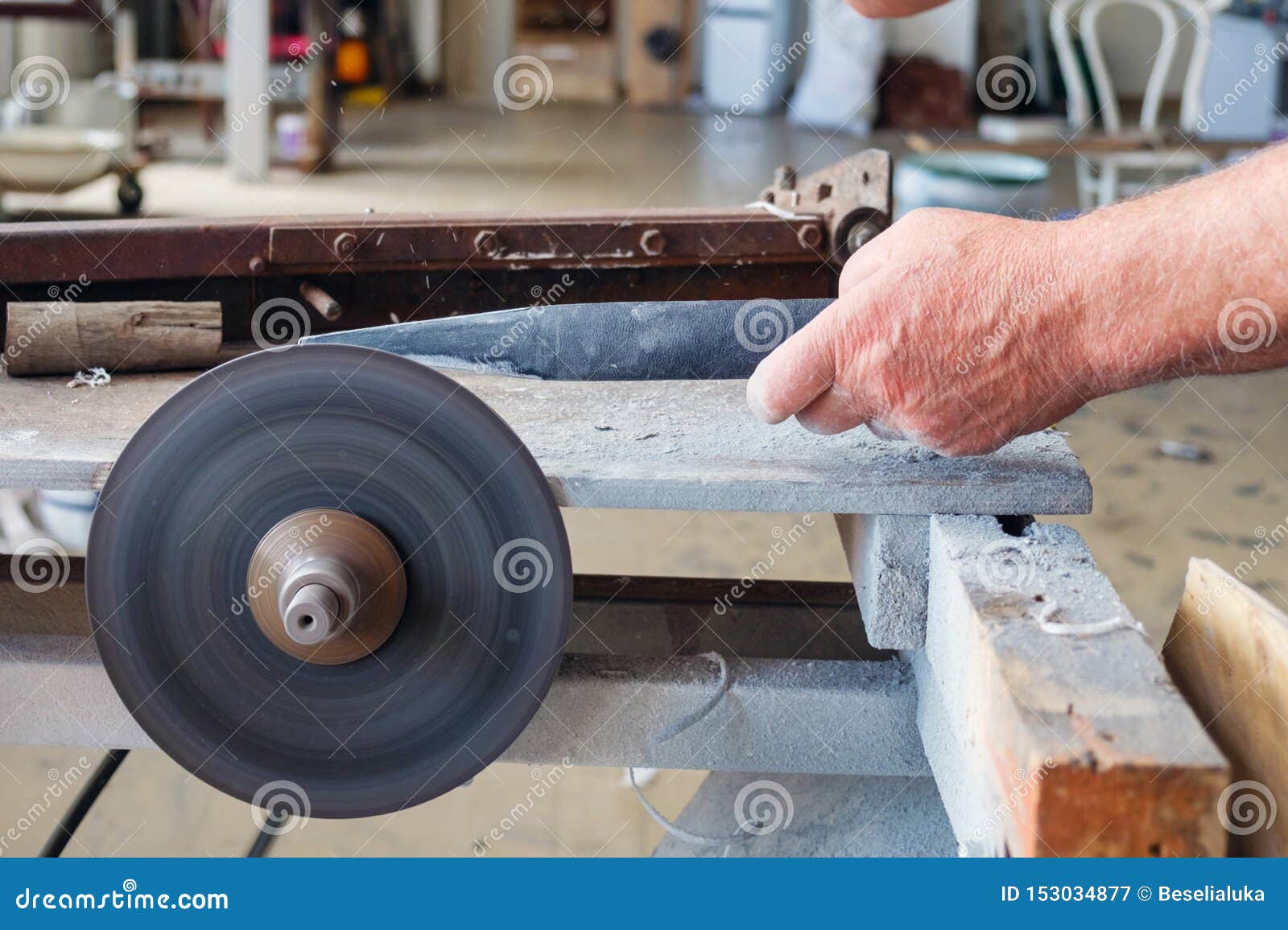 Hands of Worker Wich is Sharpering Knife on Grindstone Stock Image - Image  of industry, object: 153034877