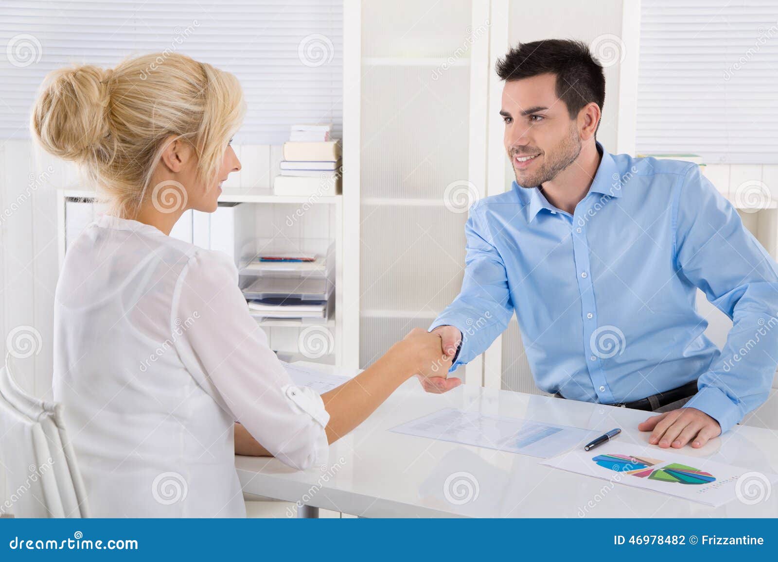 handshake: business people in a meeting. adviser and customer si