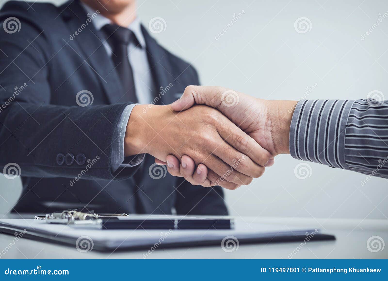 handshake of cooperation customer and salesman after agreement,