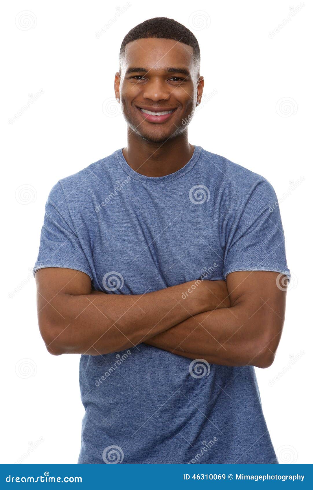 handsome african american man smiling with arms crossed